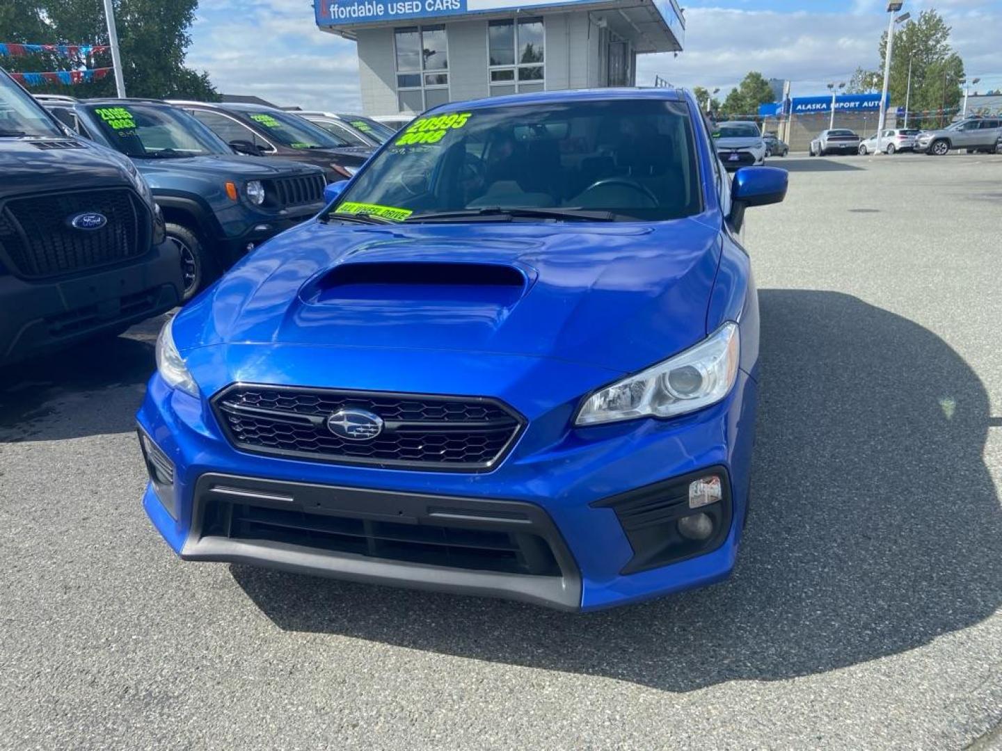 2018 BLUE SUBARU WRX PREMIUM (JF1VA1C60J8) with an 2.0L engine, Continuously Variable transmission, located at 929 East 8th Ave, Anchorage, AK, 99501, (907) 274-2277, 61.214783, -149.866074 - Photo#0