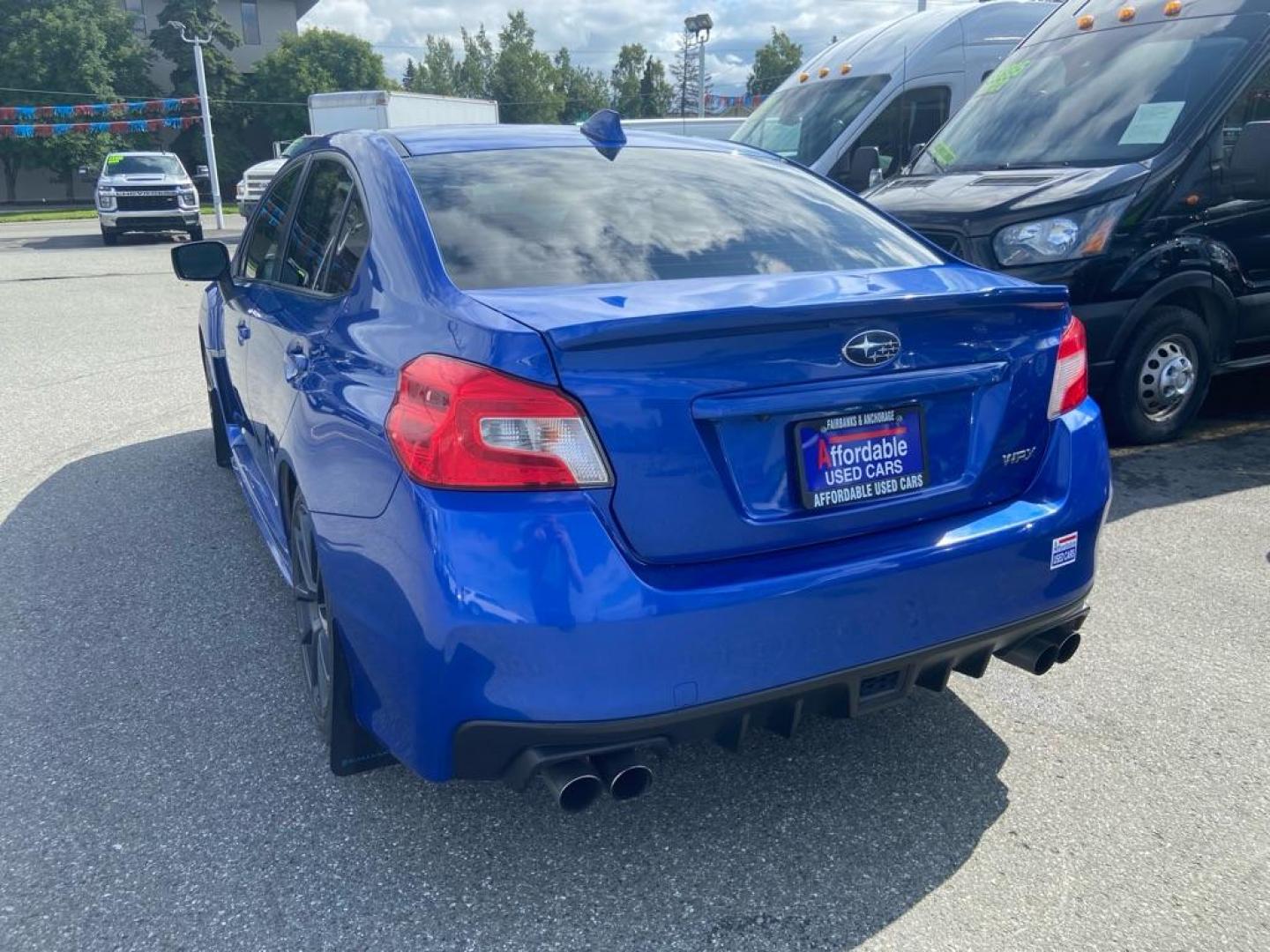 2018 BLUE SUBARU WRX PREMIUM (JF1VA1C60J8) with an 2.0L engine, Continuously Variable transmission, located at 929 East 8th Ave, Anchorage, AK, 99501, (907) 274-2277, 61.214783, -149.866074 - Photo#2