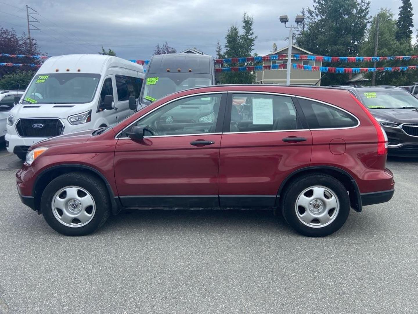 2011 RED HONDA CR-V LX (JHLRE4H32BC) with an 2.4L engine, Automatic transmission, located at 929 East 8th Ave, Anchorage, AK, 99501, (907) 274-2277, 61.214783, -149.866074 - Photo#1