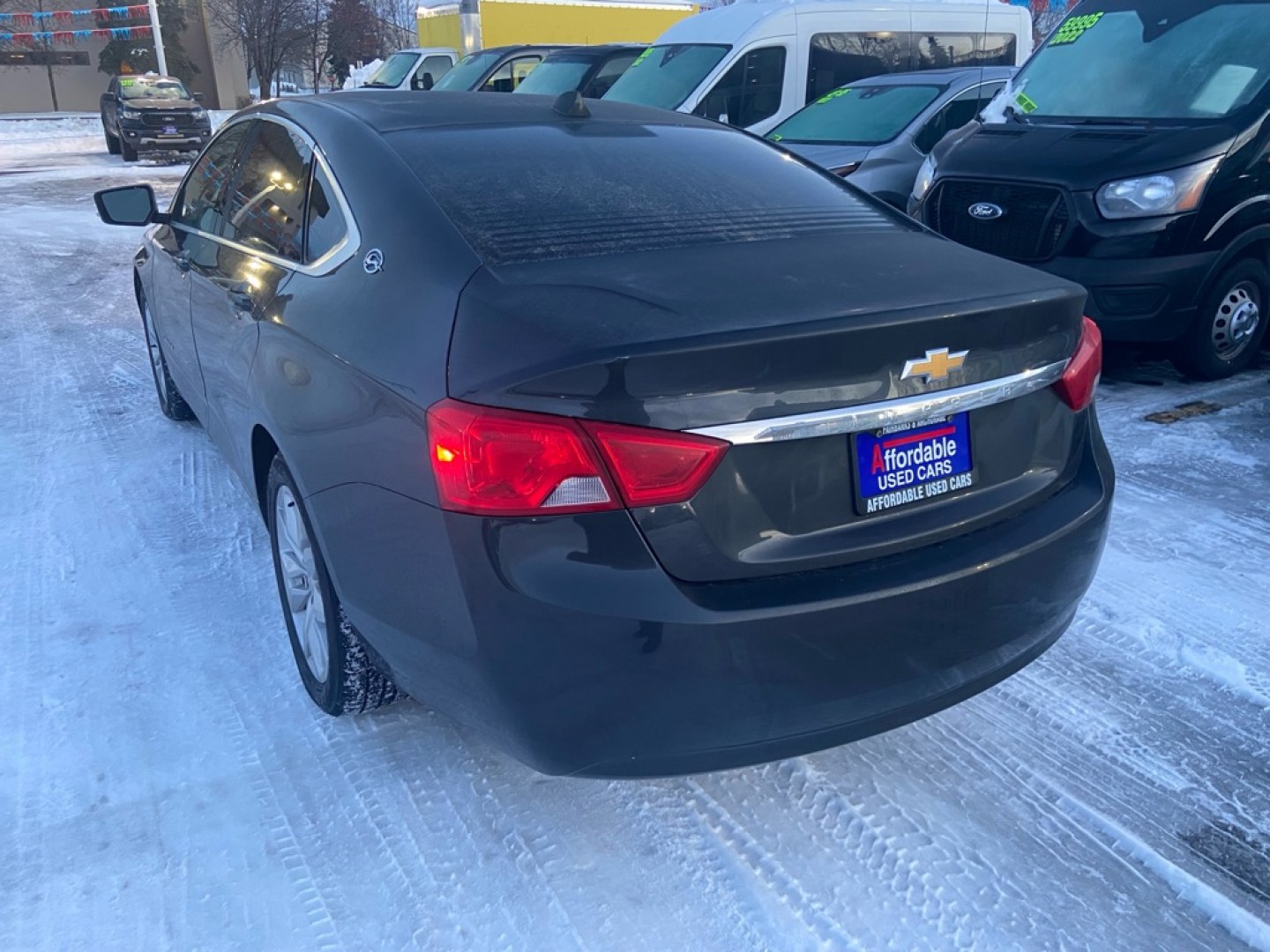 2014 BLACK CHEVROLET IMPALA LT (2G1125S34E9) with an 3.6L engine, Automatic transmission, located at 929 East 8th Ave, Anchorage, AK, 99501, (907) 274-2277, 61.214783, -149.866074- Photo#1