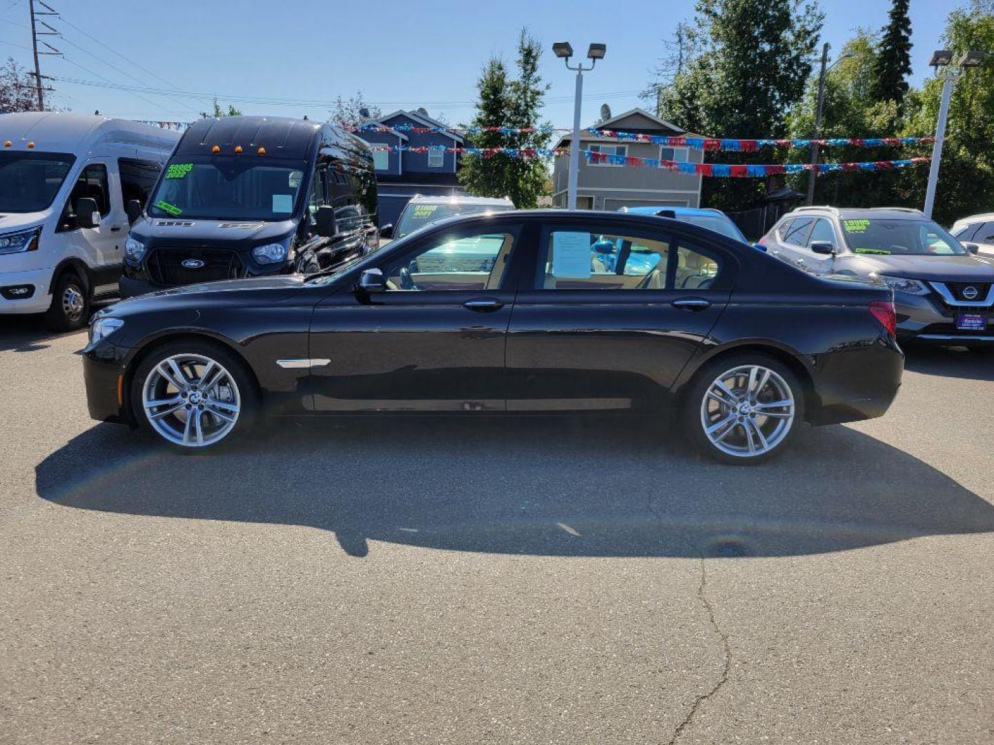 2015 BLACK BMW 750 LXI (WBAYF8C55FD) with an 4.4L engine, Automatic transmission, located at 929 East 8th Ave, Anchorage, AK, 99501, (907) 274-2277, 61.214783, -149.866074 - Photo#1