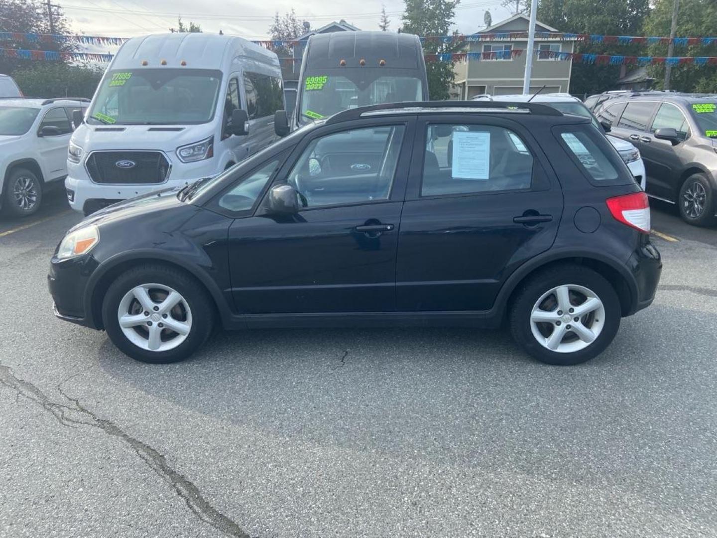 2009 BLACK SUZUKI SX4 TECHNOLOGY (JS2YB413195) with an 2.0L engine, Automatic transmission, located at 929 East 8th Ave, Anchorage, AK, 99501, (907) 274-2277, 61.214783, -149.866074 - Photo#1