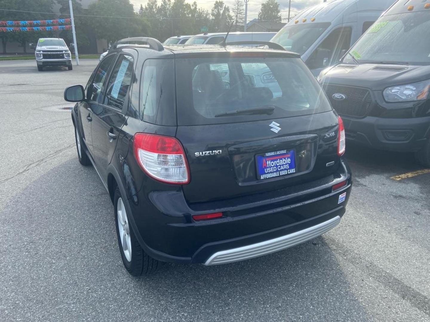 2009 BLACK SUZUKI SX4 TECHNOLOGY (JS2YB413195) with an 2.0L engine, Automatic transmission, located at 929 East 8th Ave, Anchorage, AK, 99501, (907) 274-2277, 61.214783, -149.866074 - Photo#2