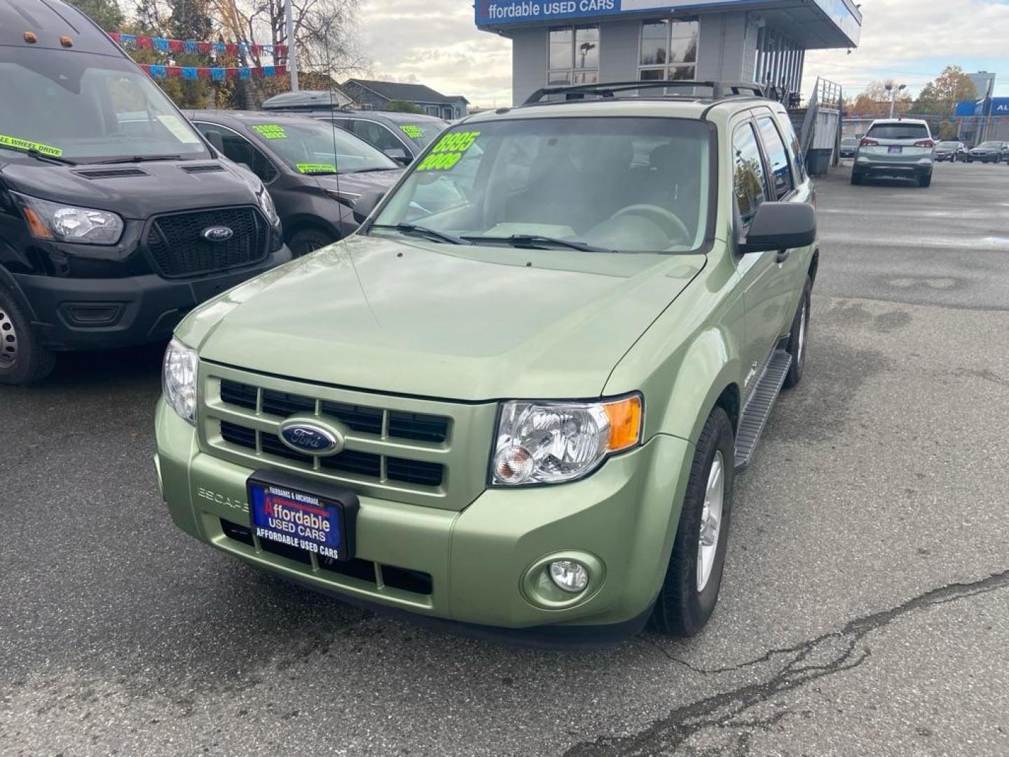 2009 GREEN FORD ESCAPE HYBRID (1FMCU59349K) with an 2.5L engine, Continuously Variable transmission, located at 929 East 8th Ave, Anchorage, AK, 99501, (907) 274-2277, 61.214783, -149.866074 - Photo#0