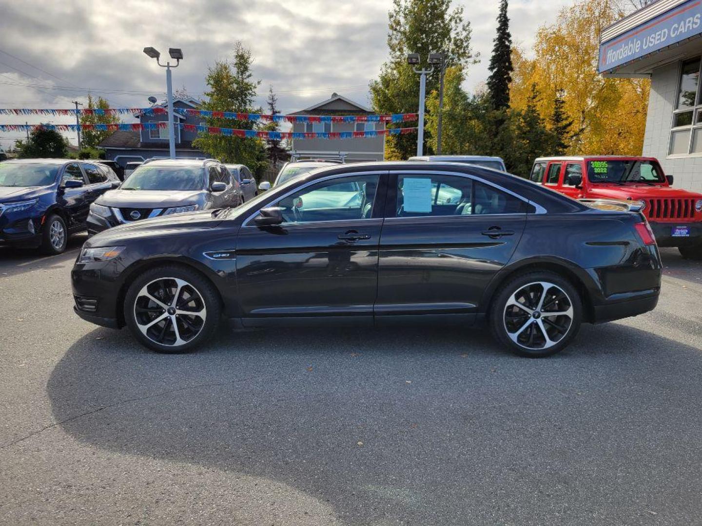 2015 BLACK FORD TAURUS SHO (1FAHP2KT3FG) with an 3.5L engine, Automatic transmission, located at 929 East 8th Ave, Anchorage, AK, 99501, (907) 274-2277, 61.214783, -149.866074 - Photo#1