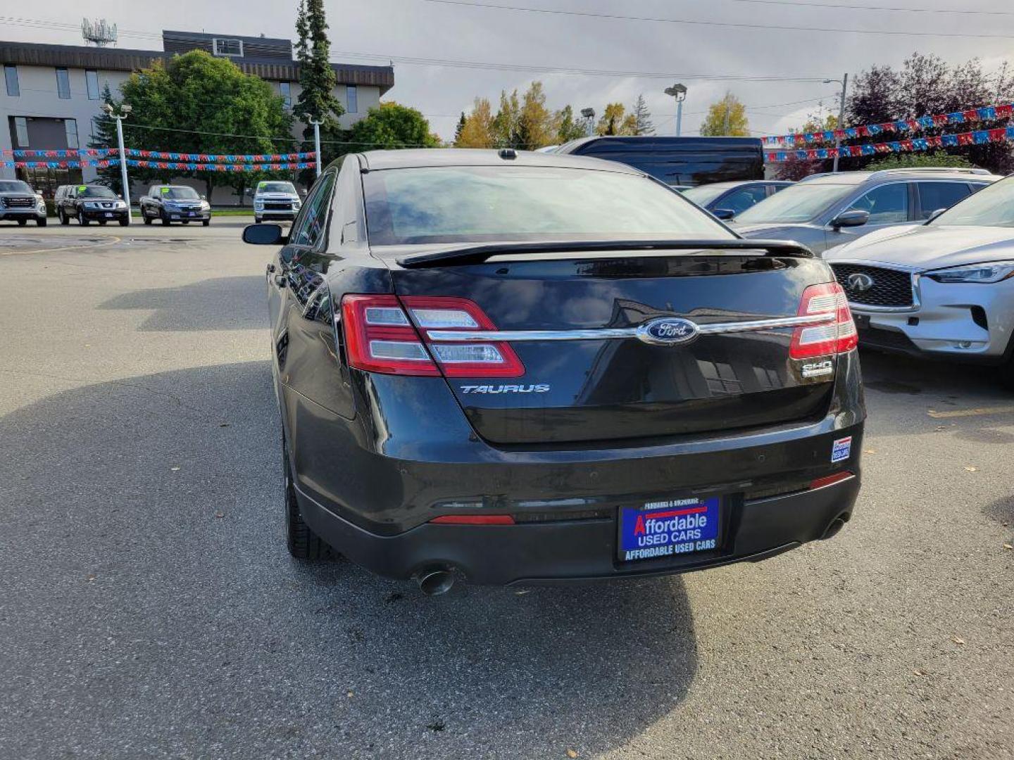 2015 BLACK FORD TAURUS SHO (1FAHP2KT3FG) with an 3.5L engine, Automatic transmission, located at 929 East 8th Ave, Anchorage, AK, 99501, (907) 274-2277, 61.214783, -149.866074 - Photo#2