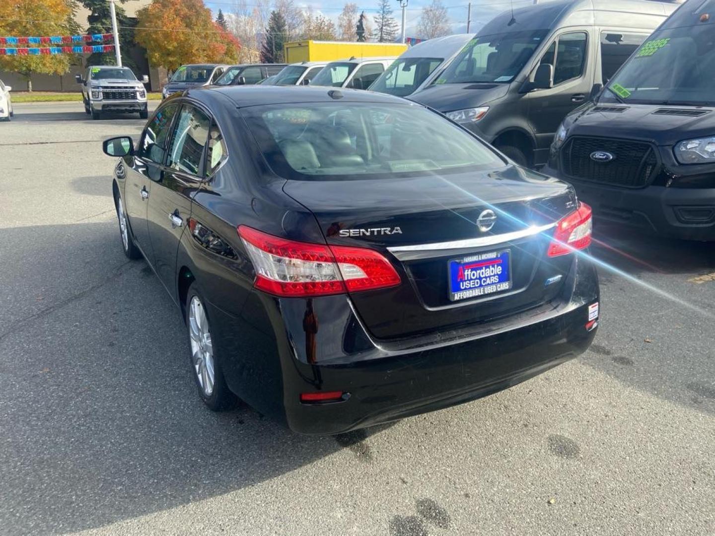 2014 BLACK NISSAN SENTRA S (3N1AB7AP8EY) with an 1.8L engine, Continuously Variable transmission, located at 929 East 8th Ave, Anchorage, AK, 99501, (907) 274-2277, 61.214783, -149.866074 - Photo#2