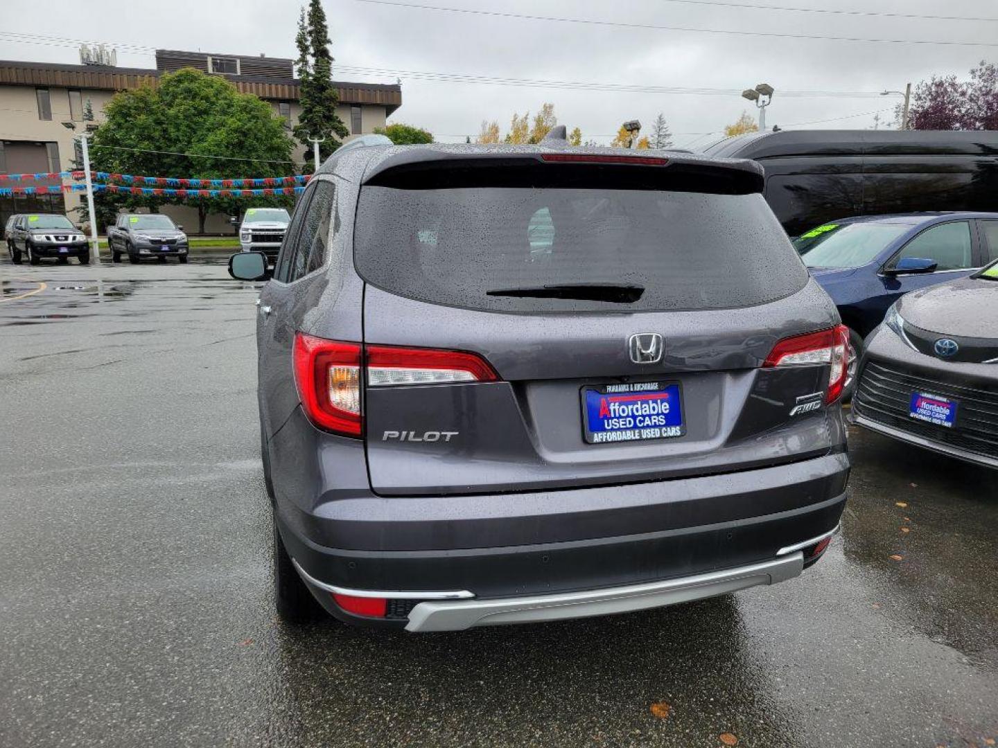 2020 GRAY HONDA PILOT TOURING (5FNYF6H62LB) with an 3.5L engine, Automatic transmission, located at 929 East 8th Ave, Anchorage, AK, 99501, (907) 274-2277, 61.214783, -149.866074 - Photo#2