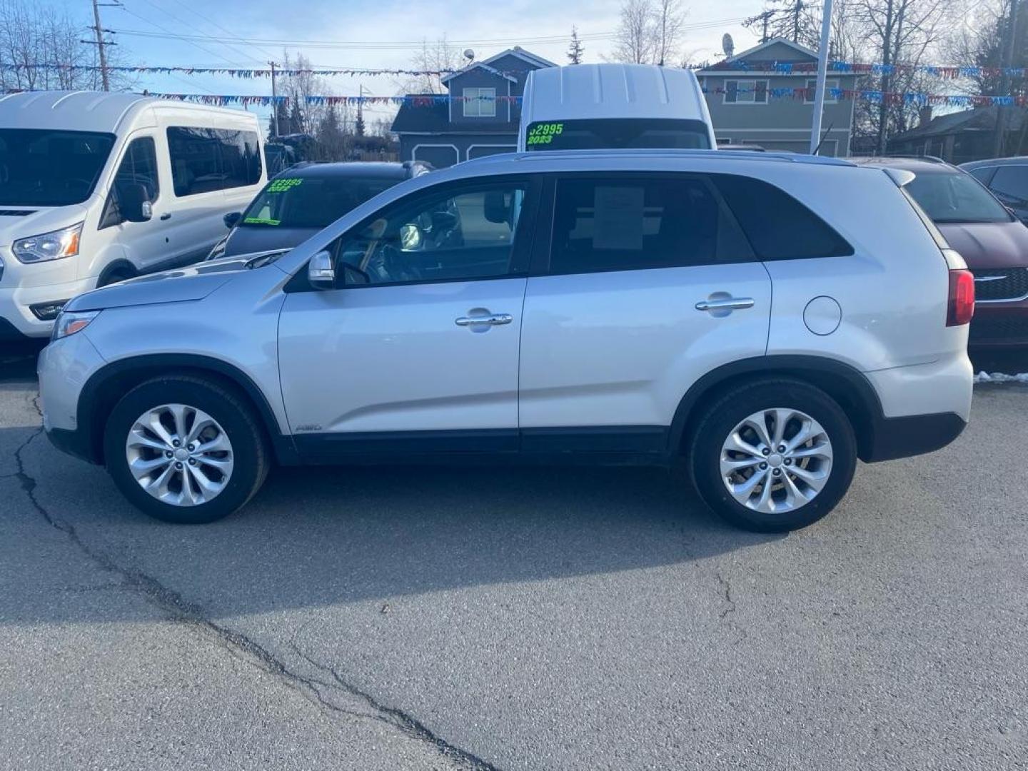 2014 SILVER KIA SORENTO EX (5XYKUDA72EG) with an 3.3L engine, Automatic transmission, located at 929 East 8th Ave, Anchorage, AK, 99501, (907) 274-2277, 61.214783, -149.866074 - Photo#1