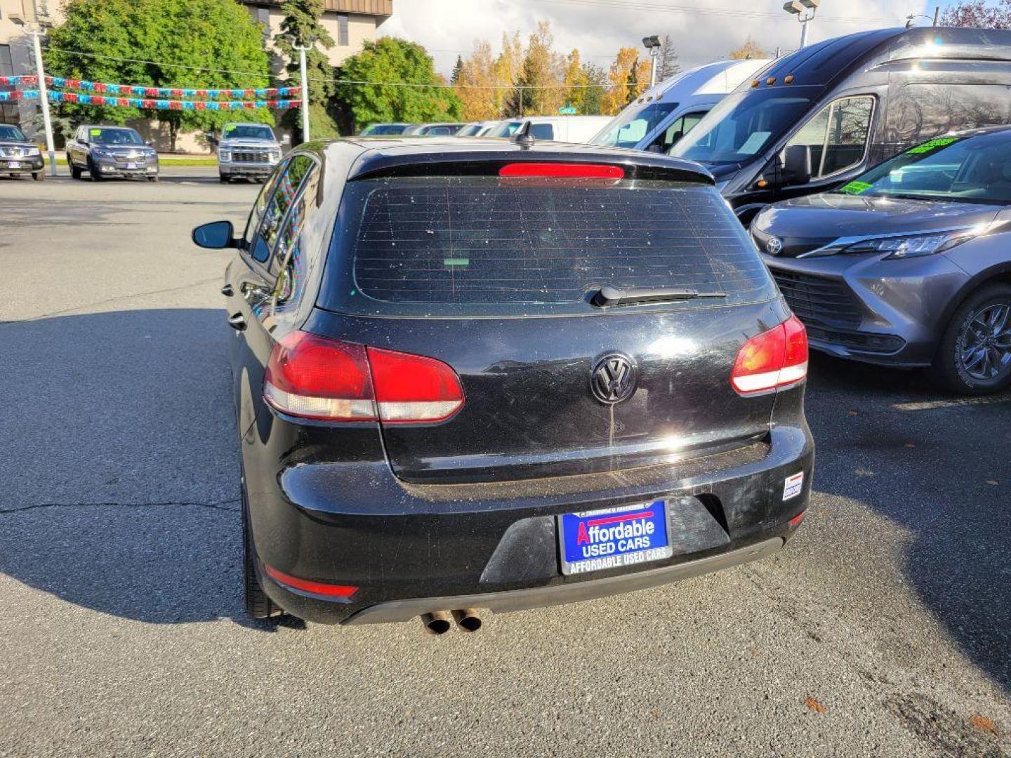 2014 BLACK VOLKSWAGEN GOLF (WVWDM7AJ9EW) with an 2.0L engine, Automatic transmission, located at 929 East 8th Ave, Anchorage, AK, 99501, (907) 274-2277, 61.214783, -149.866074 - Photo#2