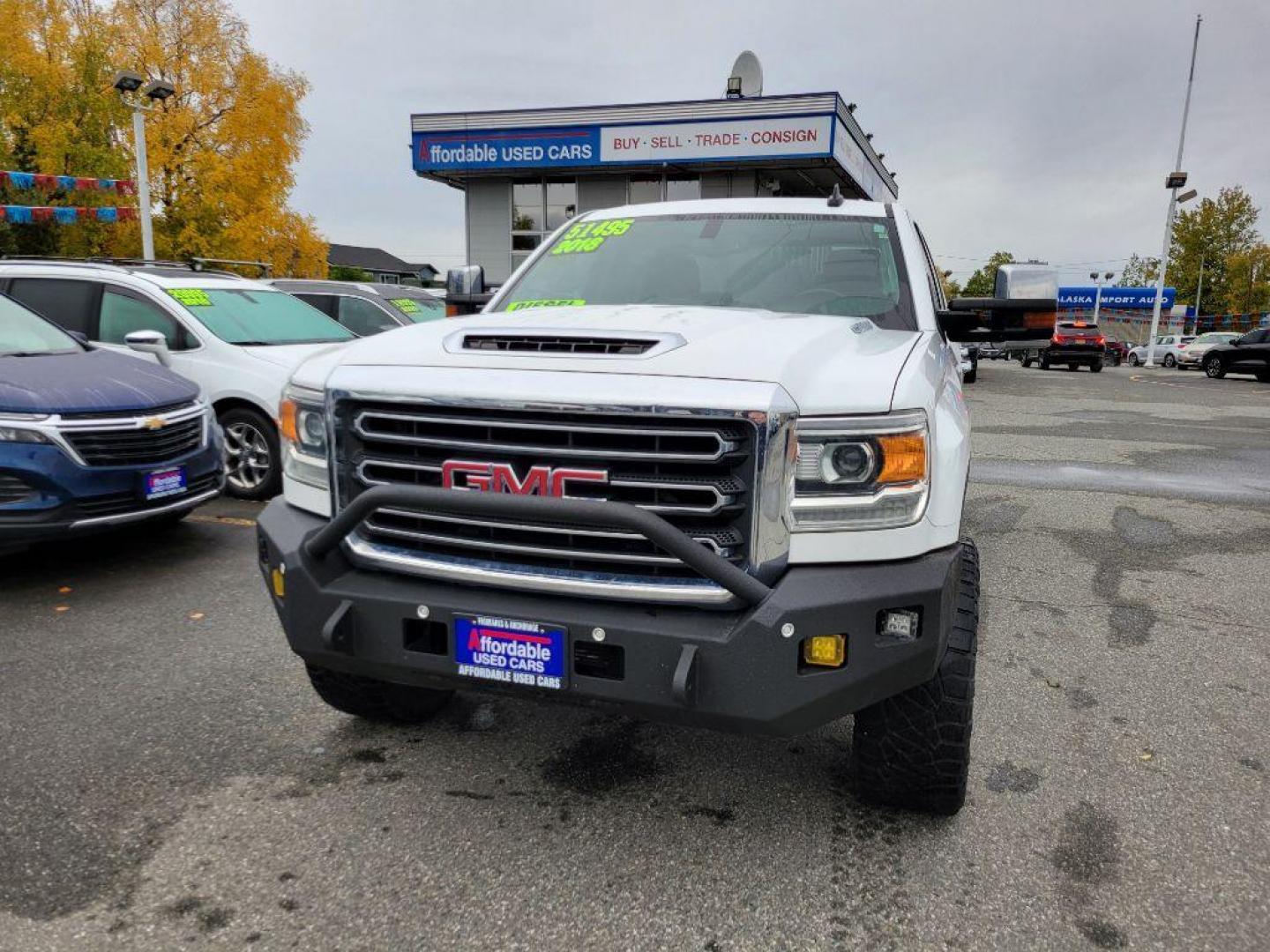 2018 WHITE GMC SIERRA 2500 SLT (1GT12TEY8JF) with an 6.6L engine, Automatic transmission, located at 929 East 8th Ave, Anchorage, AK, 99501, (907) 274-2277, 61.214783, -149.866074 - Photo#0