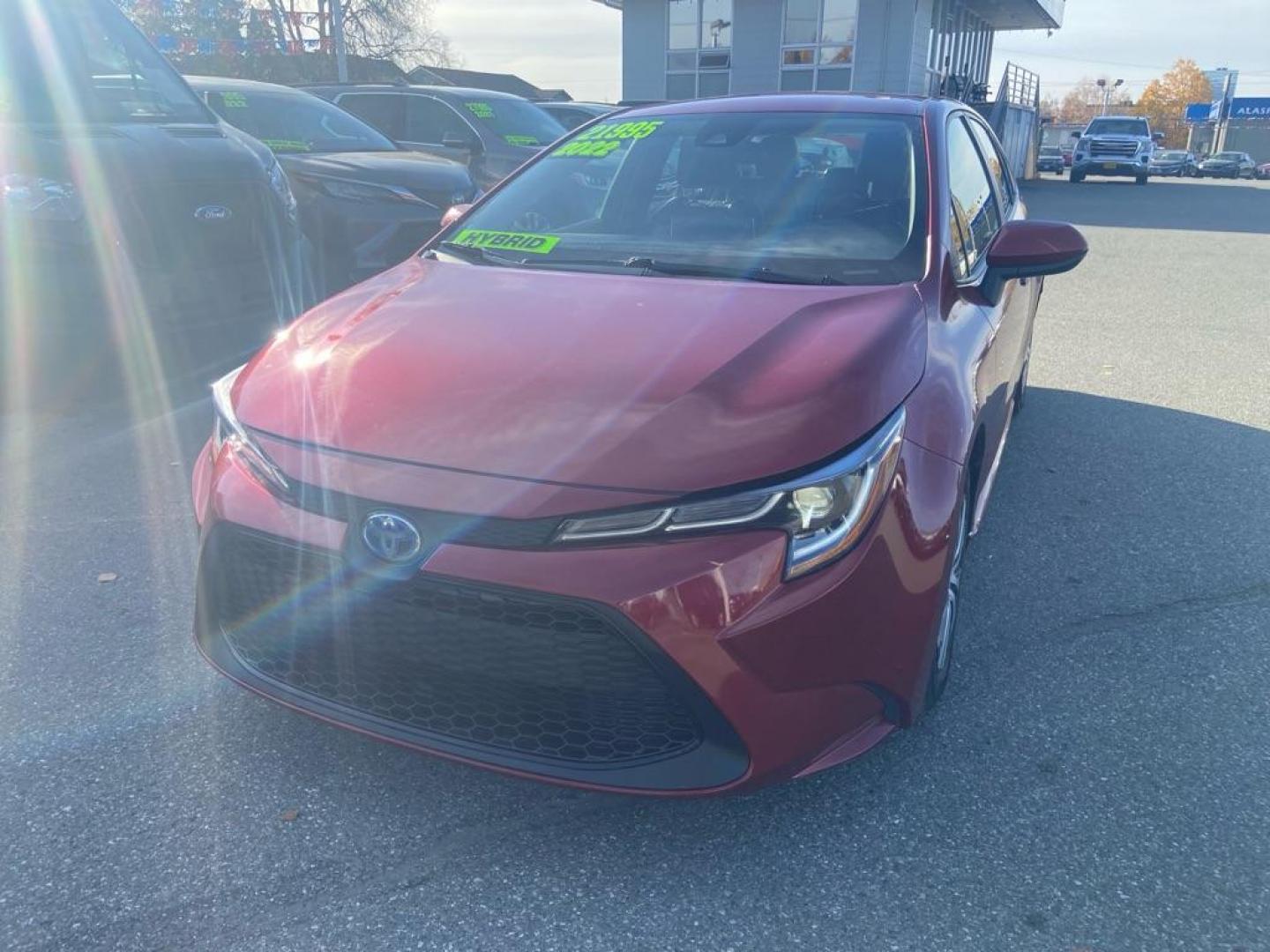 2022 RED TOYOTA COROLLA LE (JTDEAMDE2NJ) with an 1.8L engine, Continuously Variable transmission, located at 929 East 8th Ave, Anchorage, AK, 99501, (907) 274-2277, 61.214783, -149.866074 - Photo#0