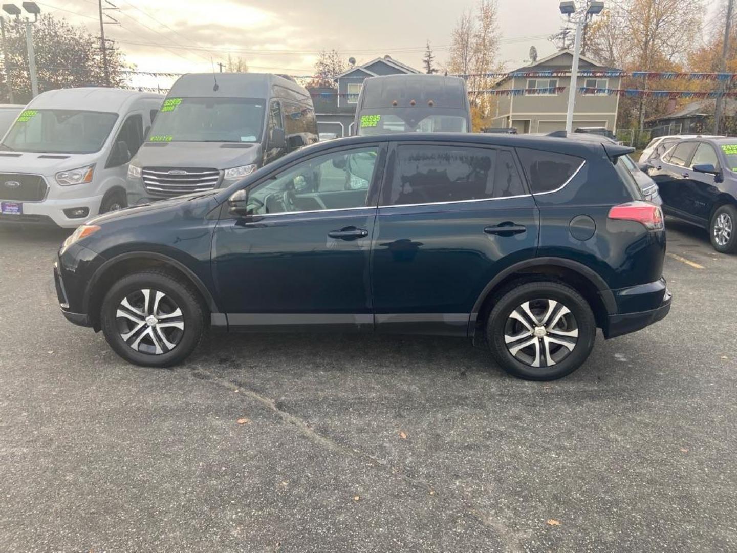 2018 BLUE TOYOTA RAV4 LE (2T3BFREV0JW) with an 2.5L engine, Automatic transmission, located at 929 East 8th Ave, Anchorage, AK, 99501, (907) 274-2277, 61.214783, -149.866074 - Photo#1