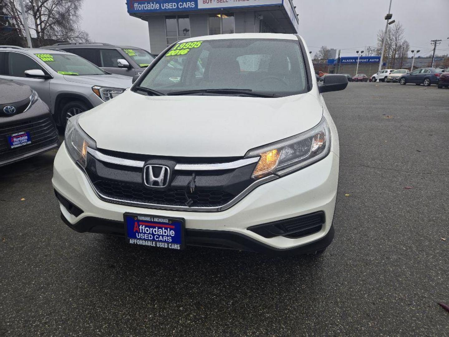 2016 WHITE HONDA CR-V LX (5J6RM4H35GL) with an 2.4L engine, Continuously Variable transmission, located at 929 East 8th Ave, Anchorage, AK, 99501, (907) 274-2277, 61.214783, -149.866074 - Photo#0