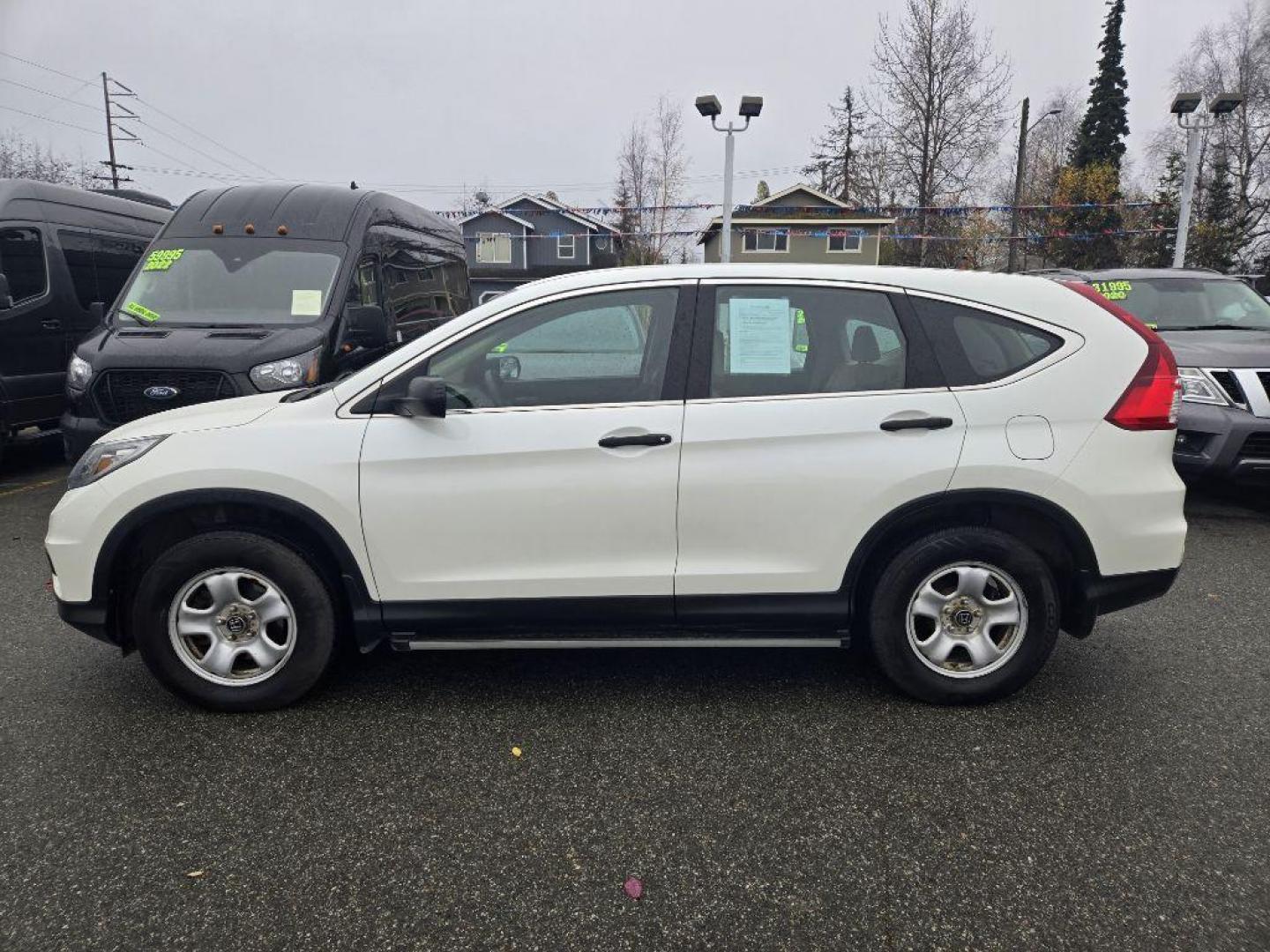 2016 WHITE HONDA CR-V LX (5J6RM4H35GL) with an 2.4L engine, Continuously Variable transmission, located at 929 East 8th Ave, Anchorage, AK, 99501, (907) 274-2277, 61.214783, -149.866074 - Photo#1