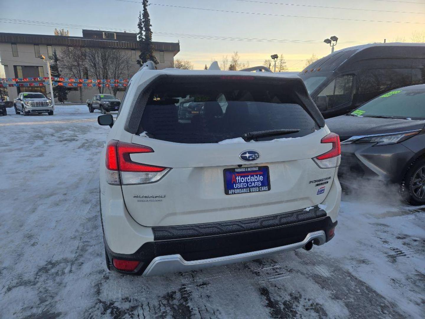 2019 WHITE SUBARU FORESTER TOURING (JF2SKAWCXKH) with an 2.5L engine, Continuously Variable transmission, located at 929 East 8th Ave, Anchorage, AK, 99501, (907) 274-2277, 61.214783, -149.866074 - Photo#2