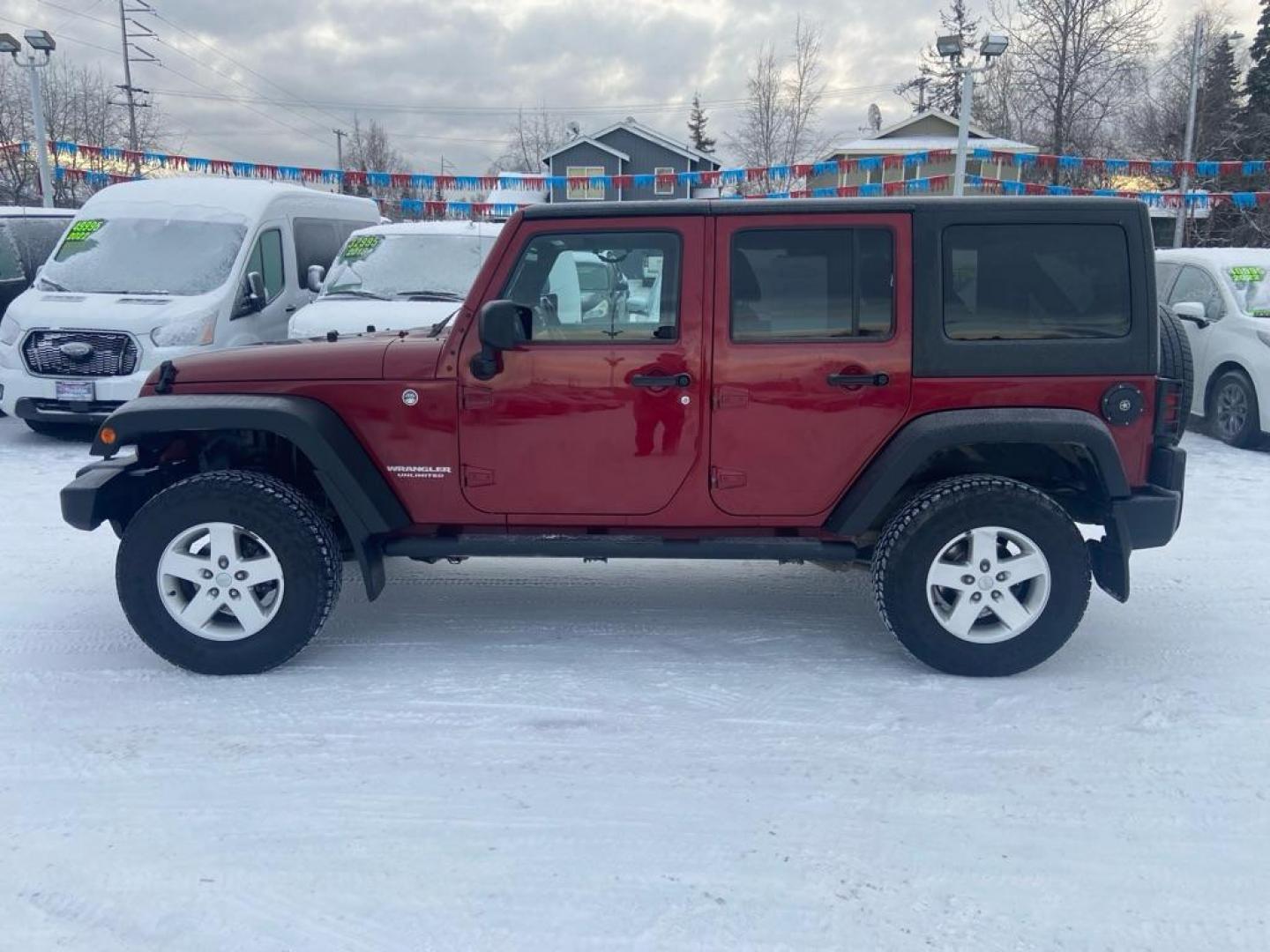 2013 JEEP WRANGLER UNLIMI SPORT (1C4BJWDG4DL) with an 3.6L engine, Automatic transmission, located at 929 East 8th Ave, Anchorage, AK, 99501, (907) 274-2277, 61.214783, -149.866074 - Photo#1