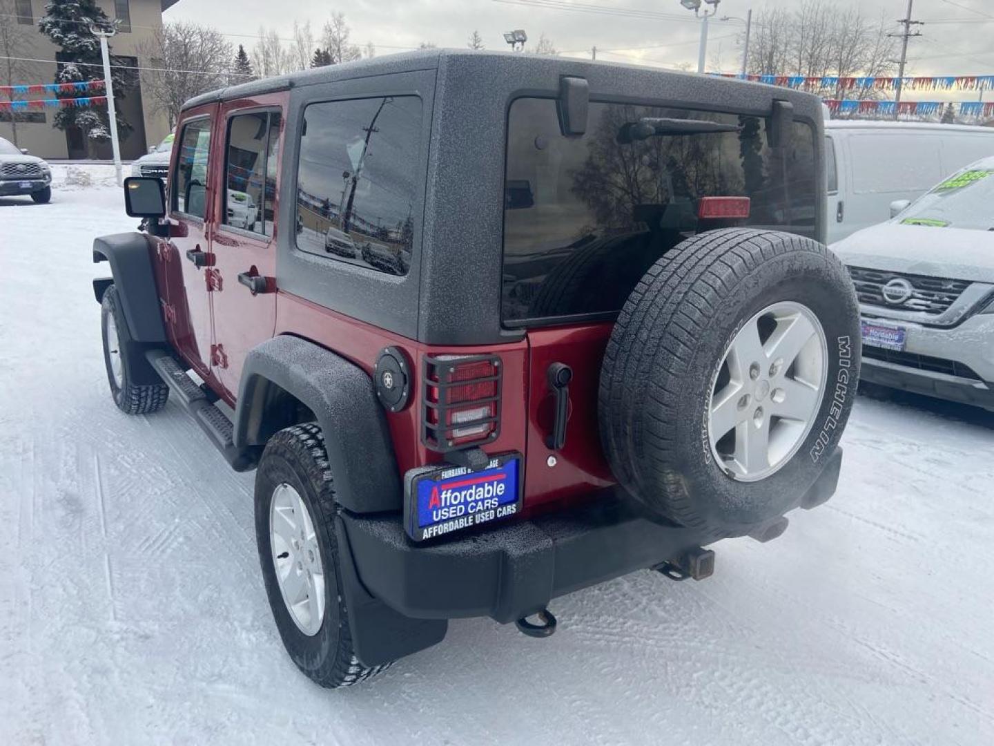 2013 JEEP WRANGLER UNLIMI SPORT (1C4BJWDG4DL) with an 3.6L engine, Automatic transmission, located at 929 East 8th Ave, Anchorage, AK, 99501, (907) 274-2277, 61.214783, -149.866074 - Photo#2