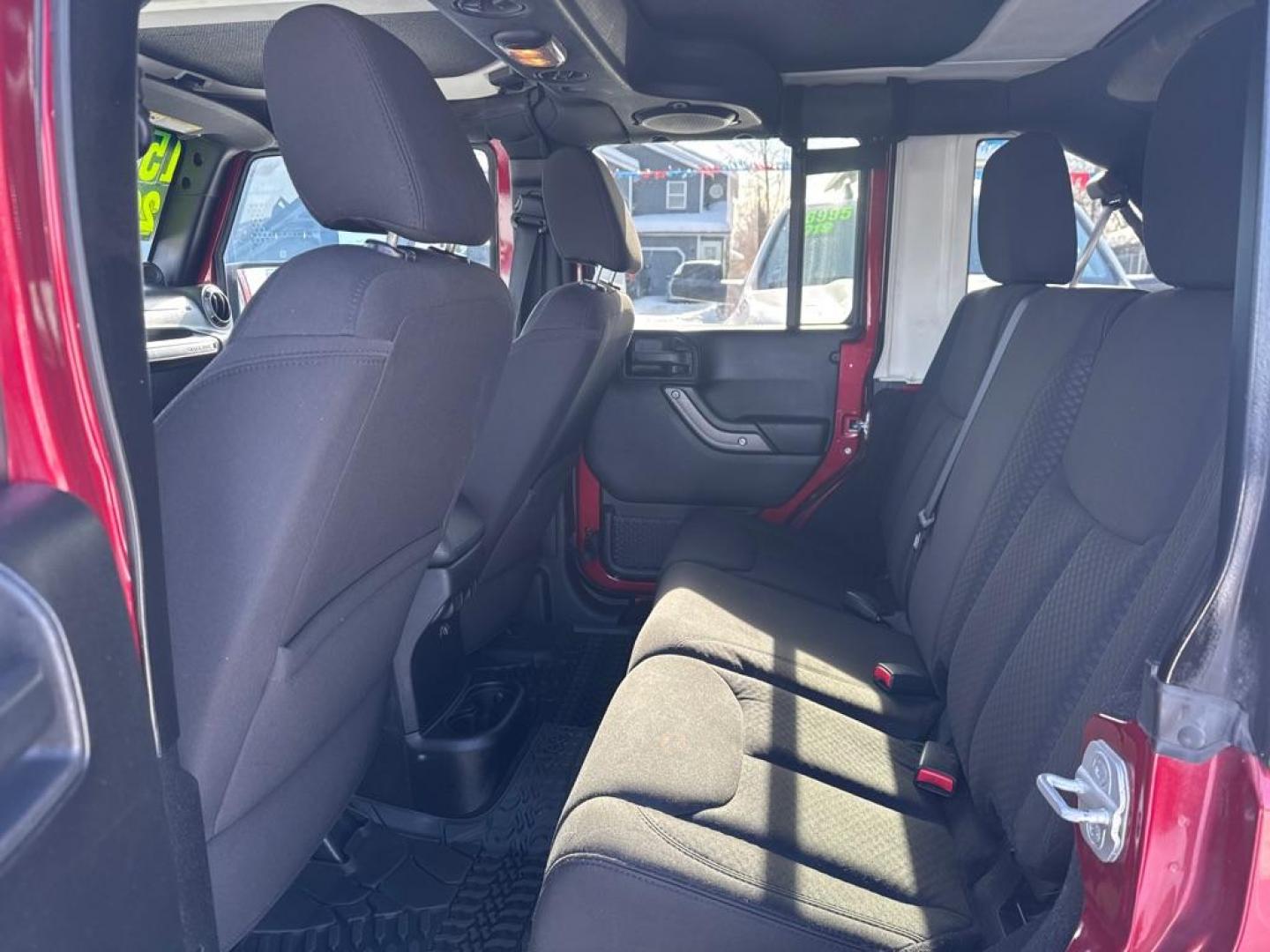 2013 RED JEEP WRANGLER UNLIMI SPORT (1C4BJWDG4DL) with an 3.6L engine, Automatic transmission, located at 929 East 8th Ave, Anchorage, AK, 99501, (907) 274-2277, 61.214783, -149.866074 - Photo#3