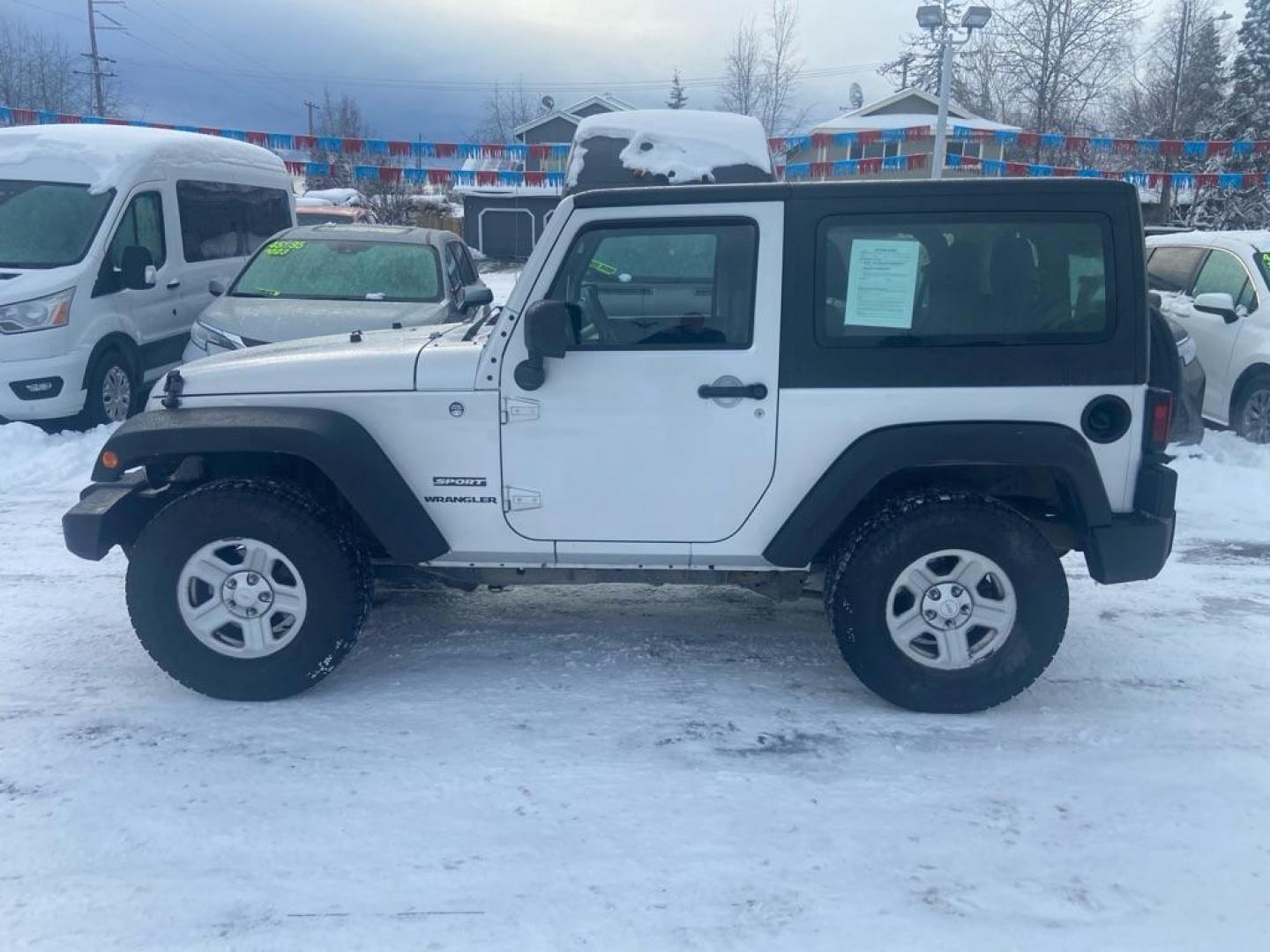 2012 SILVER JEEP WRANGLER SPORT (1C4AJWAG2CL) with an 3.6L engine, Automatic transmission, located at 929 East 8th Ave, Anchorage, AK, 99501, (907) 274-2277, 61.214783, -149.866074 - Photo#4