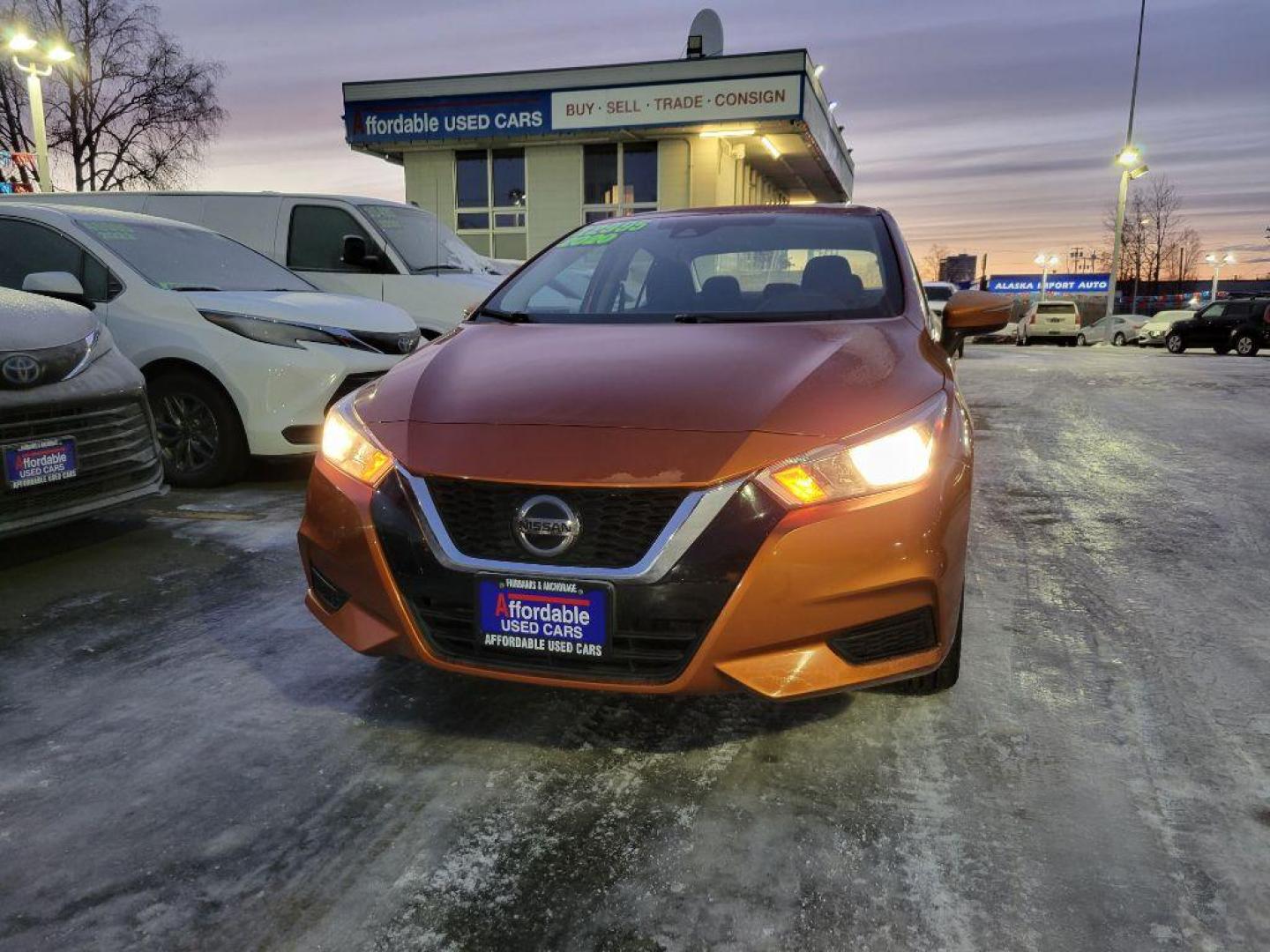 2020 ORANGE NISSAN VERSA SV (3N1CN8EVXLL) with an 1.6L engine, Continuously Variable transmission, located at 929 East 8th Ave, Anchorage, AK, 99501, (907) 274-2277, 61.214783, -149.866074 - Photo#0