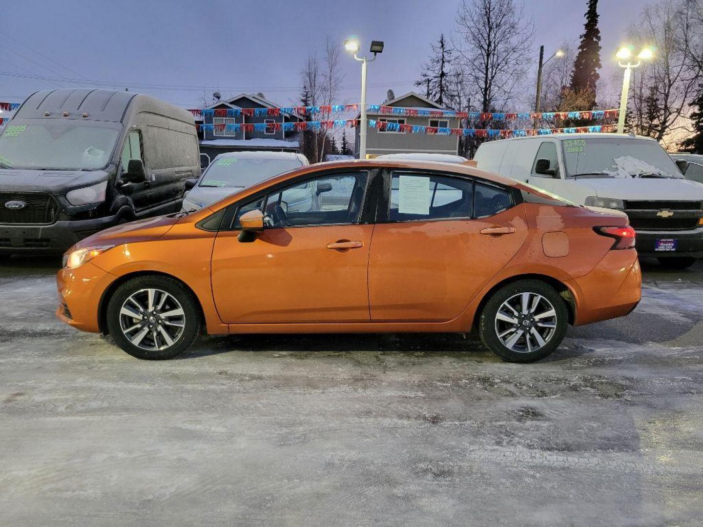 2020 ORANGE NISSAN VERSA SV (3N1CN8EVXLL) with an 1.6L engine, Continuously Variable transmission, located at 929 East 8th Ave, Anchorage, AK, 99501, (907) 274-2277, 61.214783, -149.866074 - Photo#1