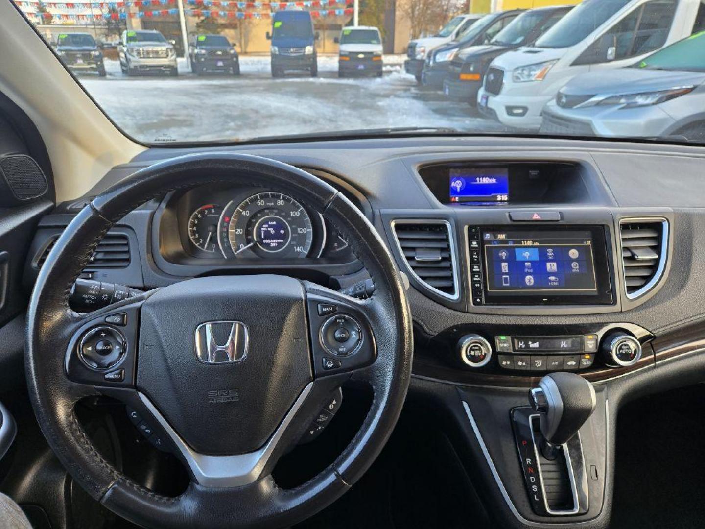 2016 BLACK HONDA CR-V TOURING (5J6RM4H90GL) with an 2.4L engine, Continuously Variable transmission, located at 929 East 8th Ave, Anchorage, AK, 99501, (907) 274-2277, 61.214783, -149.866074 - Photo#4