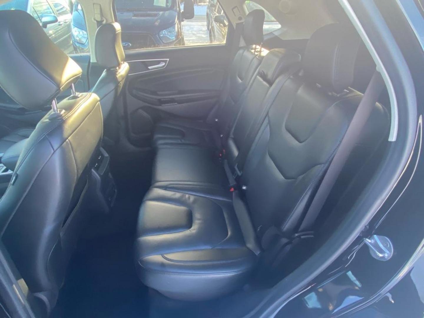 2021 BLACK FORD EDGE TITANIUM (2FMPK4K94MB) with an 2.0L engine, Automatic transmission, located at 929 East 8th Ave, Anchorage, AK, 99501, (907) 274-2277, 61.214783, -149.866074 - Photo#3