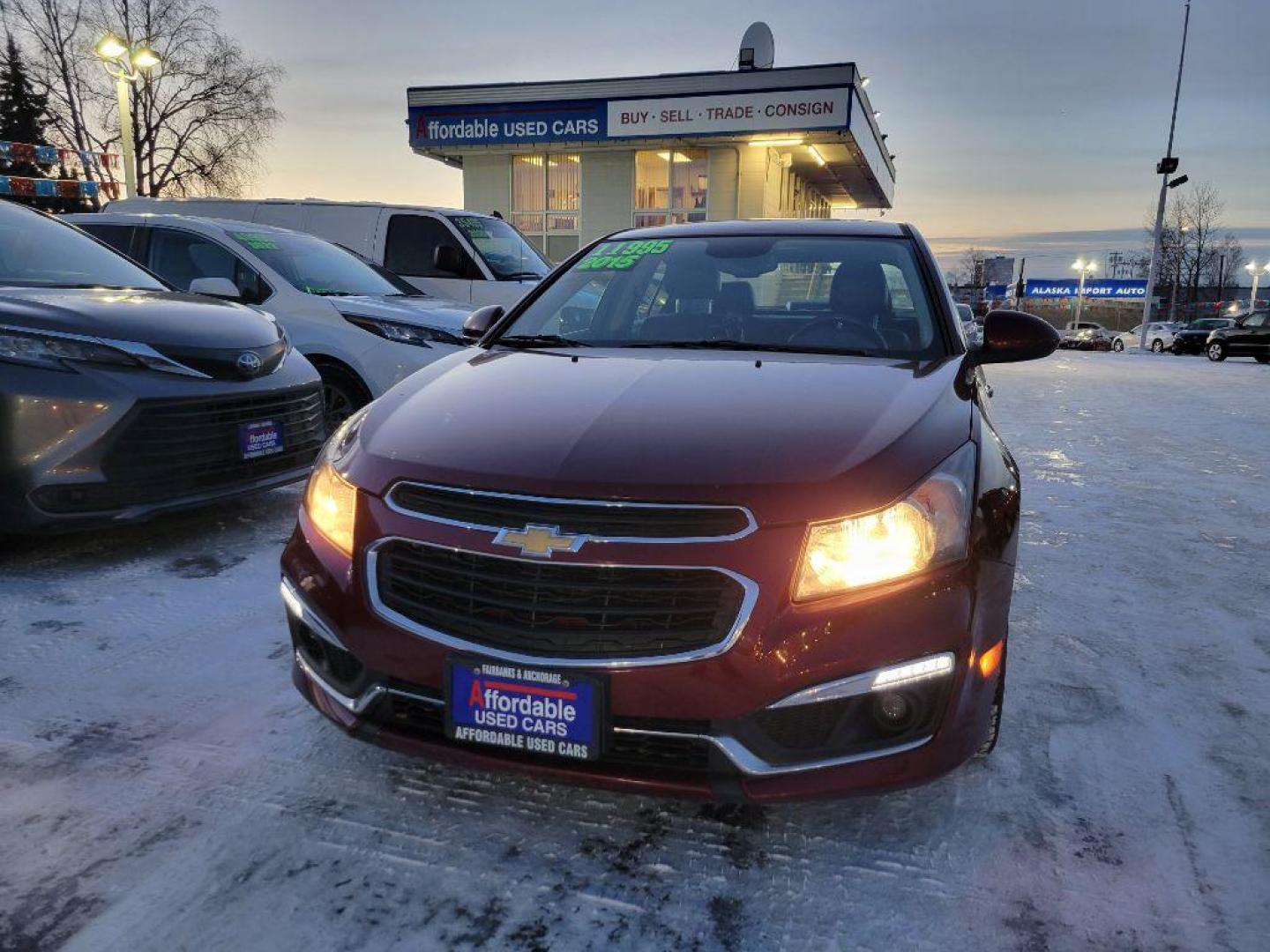 2015 MAROON CHEVROLET CRUZE LT (1G1PE5SB0F7) with an 1.4L engine, Automatic transmission, located at 929 East 8th Ave, Anchorage, AK, 99501, (907) 274-2277, 61.214783, -149.866074 - Photo#0