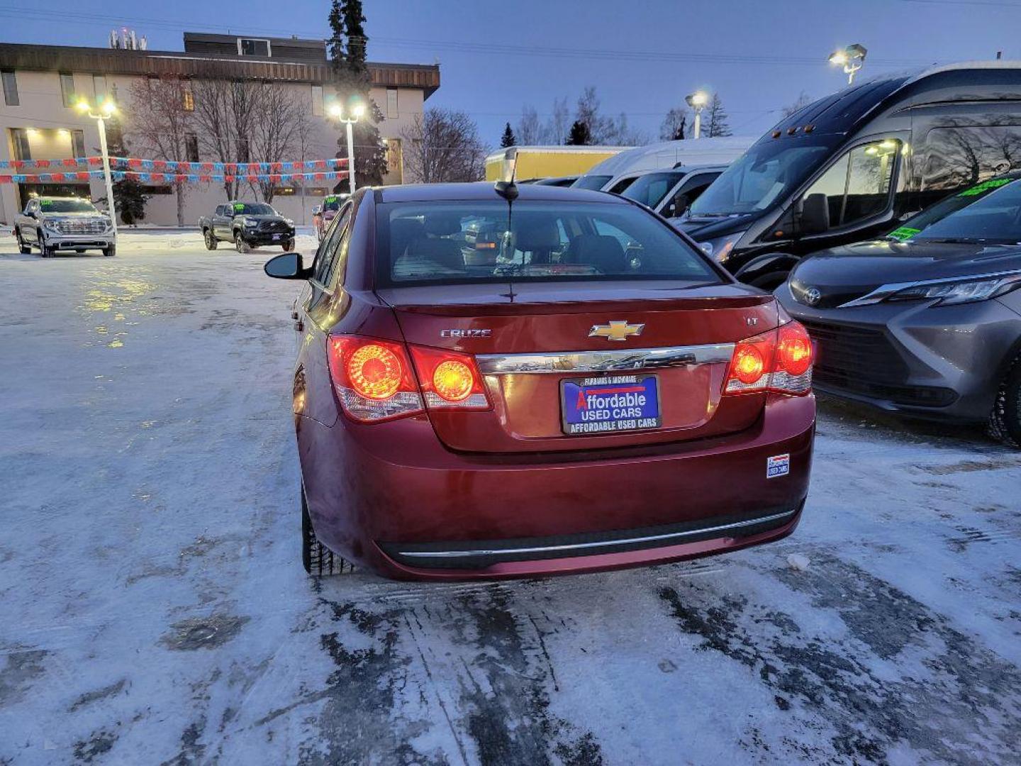 2015 MAROON CHEVROLET CRUZE LT (1G1PE5SB0F7) with an 1.4L engine, Automatic transmission, located at 929 East 8th Ave, Anchorage, AK, 99501, (907) 274-2277, 61.214783, -149.866074 - Photo#2