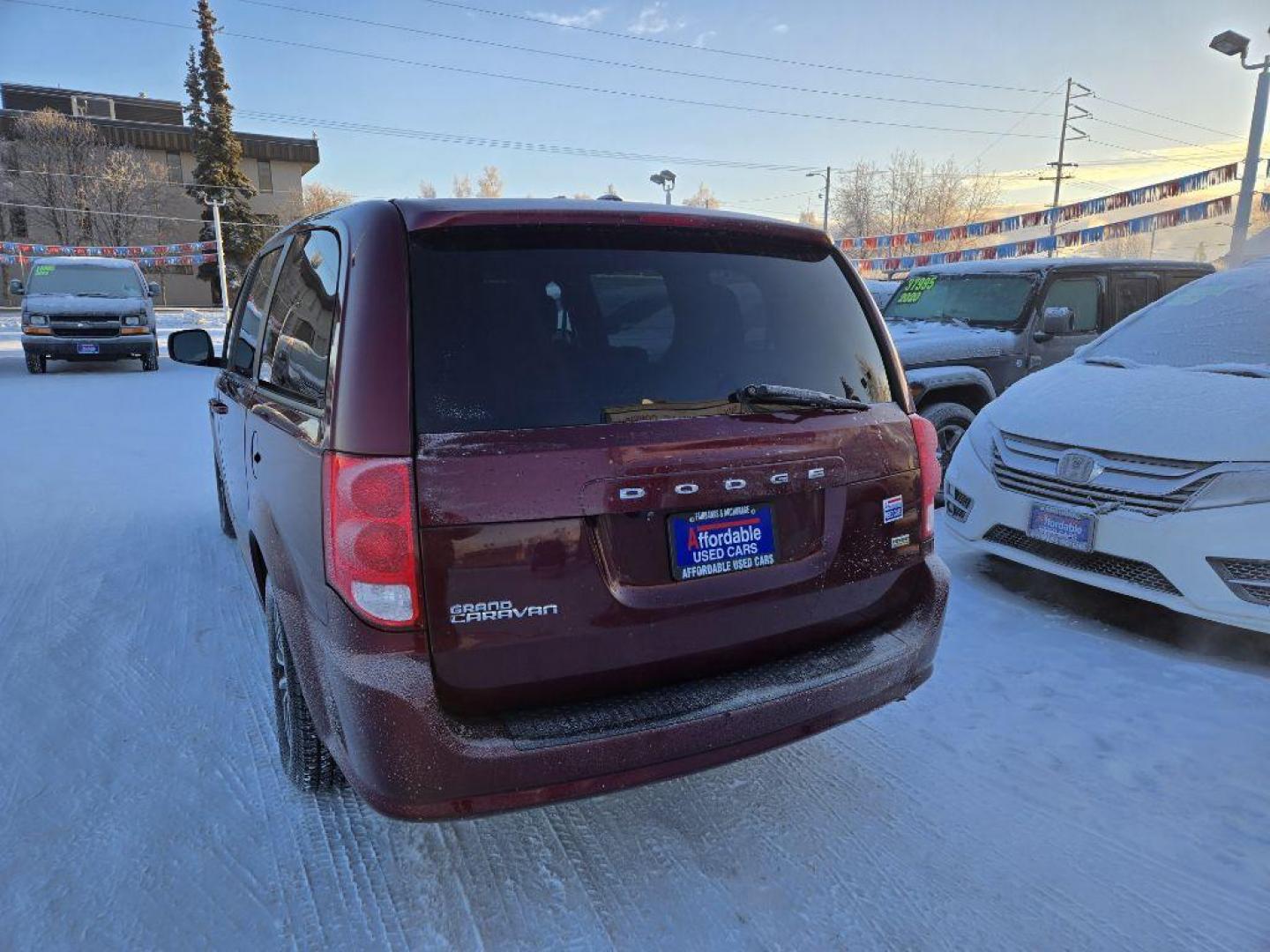 2018 MAROON DODGE GRAND CARAVAN SE (2C4RDGBG1JR) with an 3.6L engine, Automatic transmission, located at 929 East 8th Ave, Anchorage, AK, 99501, (907) 274-2277, 61.214783, -149.866074 - Photo#2