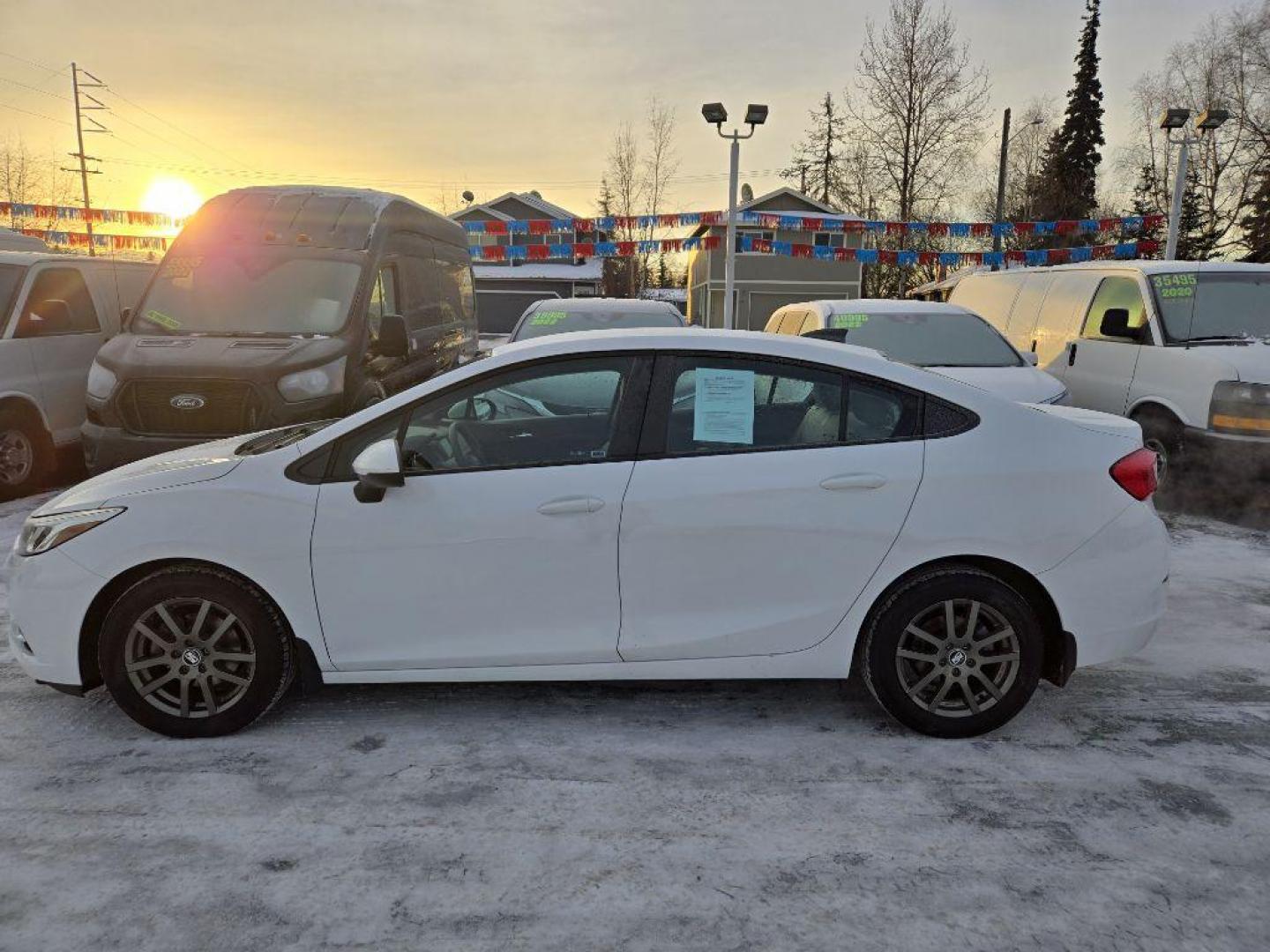 2018 WHITE CHEVROLET CRUZE LS (1G1BC5SM4J7) with an 1.4L engine, Automatic transmission, located at 929 East 8th Ave, Anchorage, AK, 99501, (907) 274-2277, 61.214783, -149.866074 - Photo#1