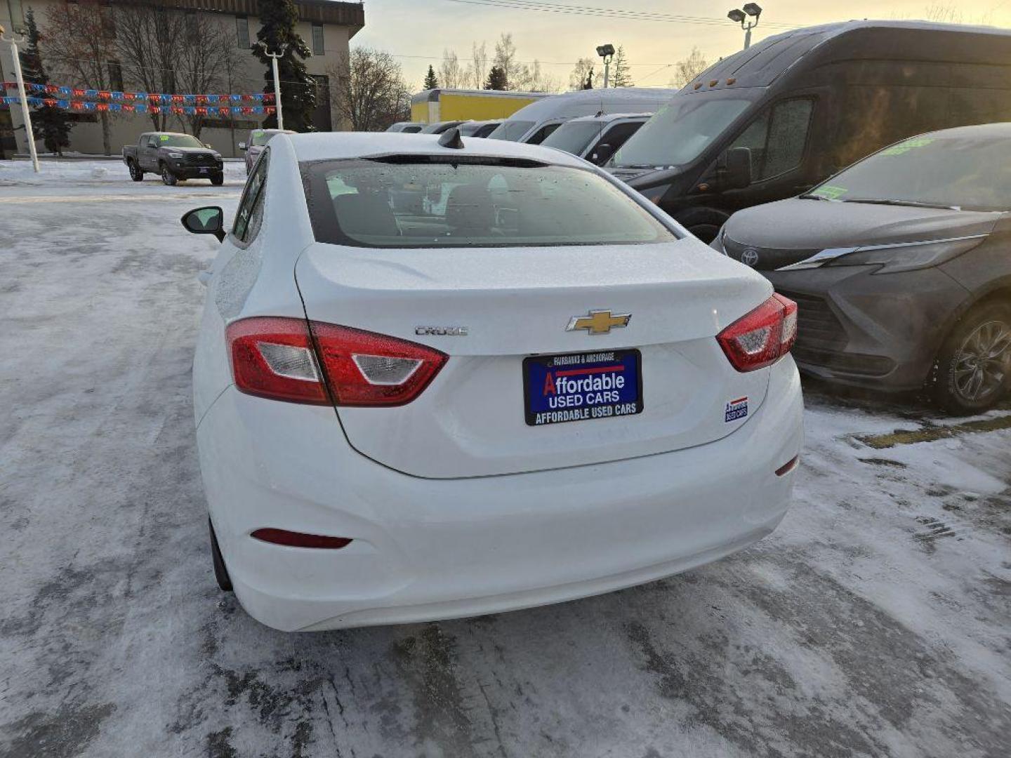 2018 WHITE CHEVROLET CRUZE LS (1G1BC5SM4J7) with an 1.4L engine, Automatic transmission, located at 929 East 8th Ave, Anchorage, AK, 99501, (907) 274-2277, 61.214783, -149.866074 - Photo#2