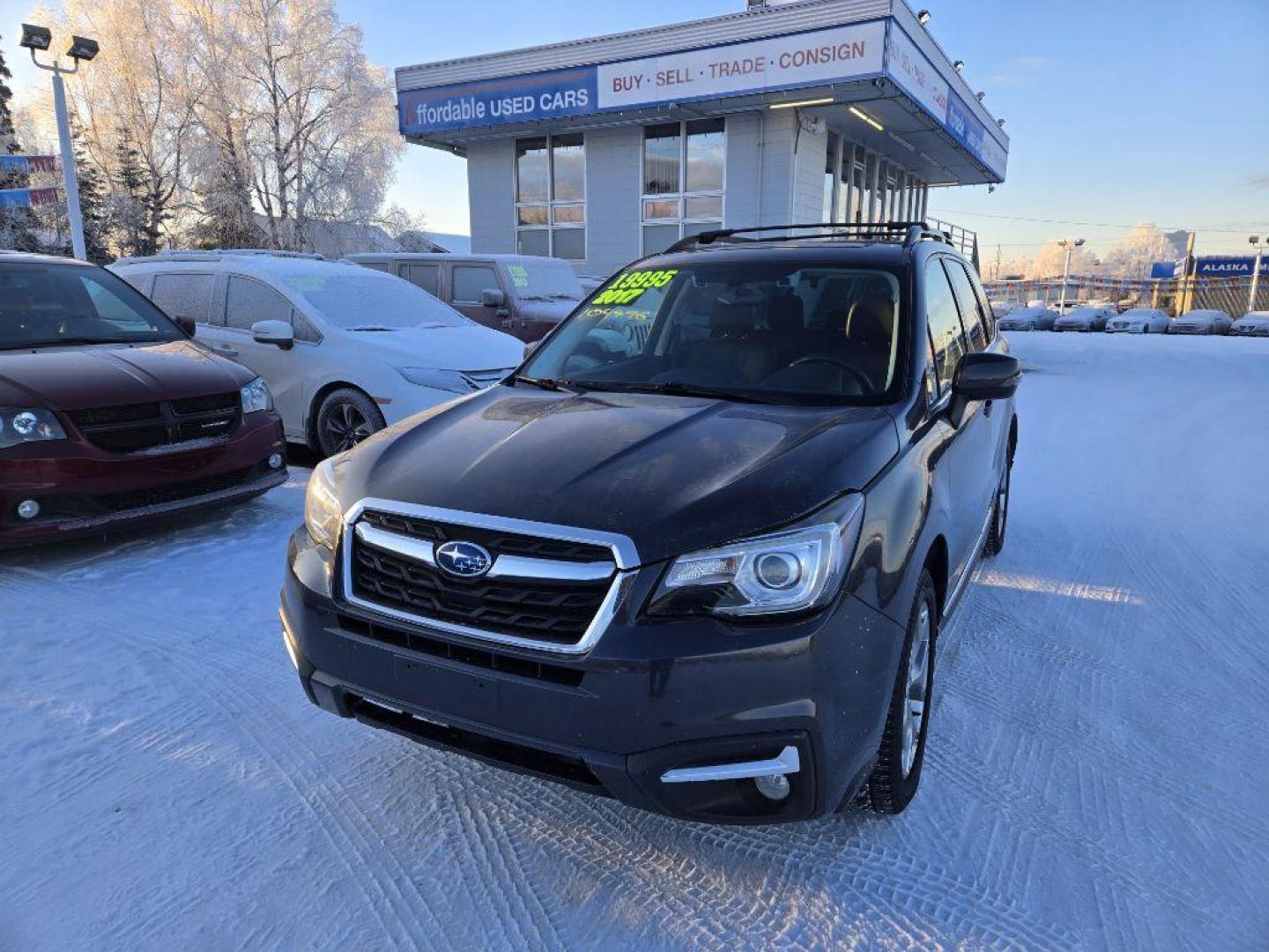 2017 BLACK SUBARU FORESTER 2.5I TOURING (JF2SJAWC6HH) with an 2.5L engine, Continuously Variable transmission, located at 929 East 8th Ave, Anchorage, AK, 99501, (907) 274-2277, 61.214783, -149.866074 - Photo#0