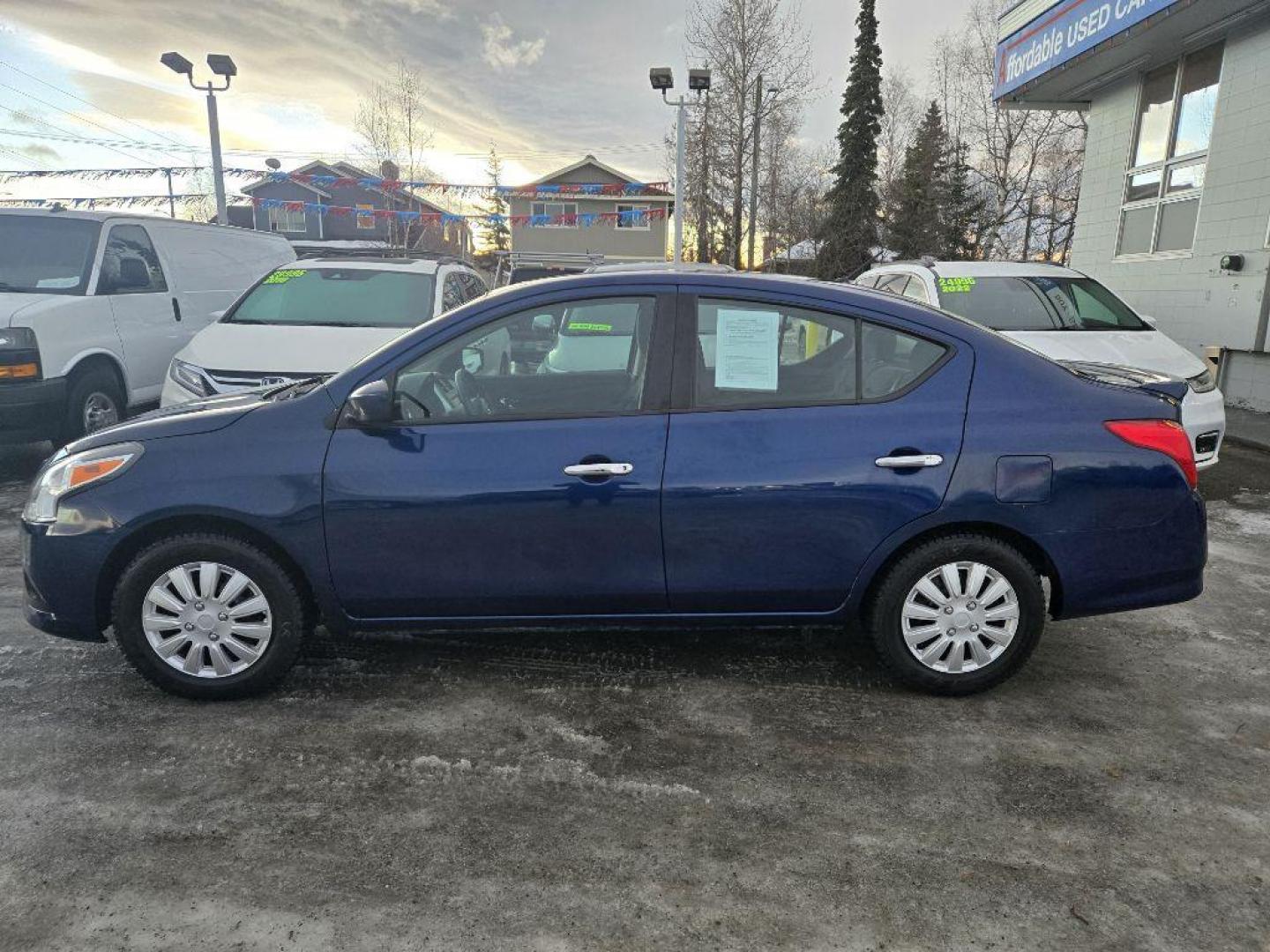 2019 BLUE NISSAN VERSA S (3N1CN7AP3KL) with an 1.6L engine, Continuously Variable transmission, located at 929 East 8th Ave, Anchorage, AK, 99501, (907) 274-2277, 61.214783, -149.866074 - Photo#1