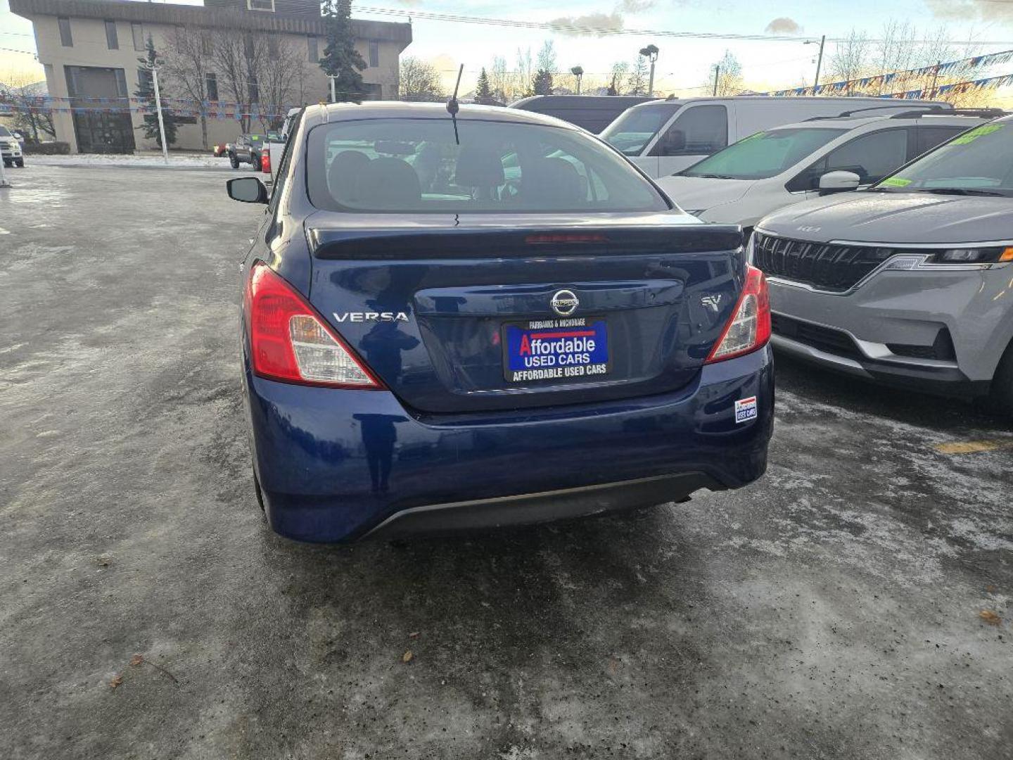 2019 BLUE NISSAN VERSA S (3N1CN7AP3KL) with an 1.6L engine, Continuously Variable transmission, located at 929 East 8th Ave, Anchorage, AK, 99501, (907) 274-2277, 61.214783, -149.866074 - Photo#2