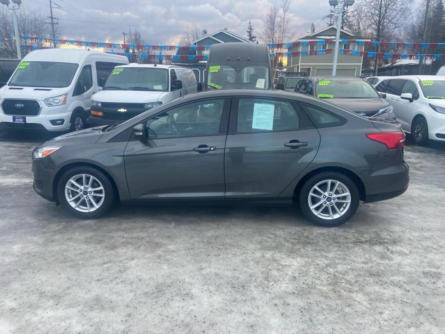 2017 GRAY FORD FOCUS SE (1FADP3F2XHL) with an 2.0L engine, Automatic transmission, located at 929 East 8th Ave, Anchorage, AK, 99501, (907) 274-2277, 61.214783, -149.866074 - Photo#1