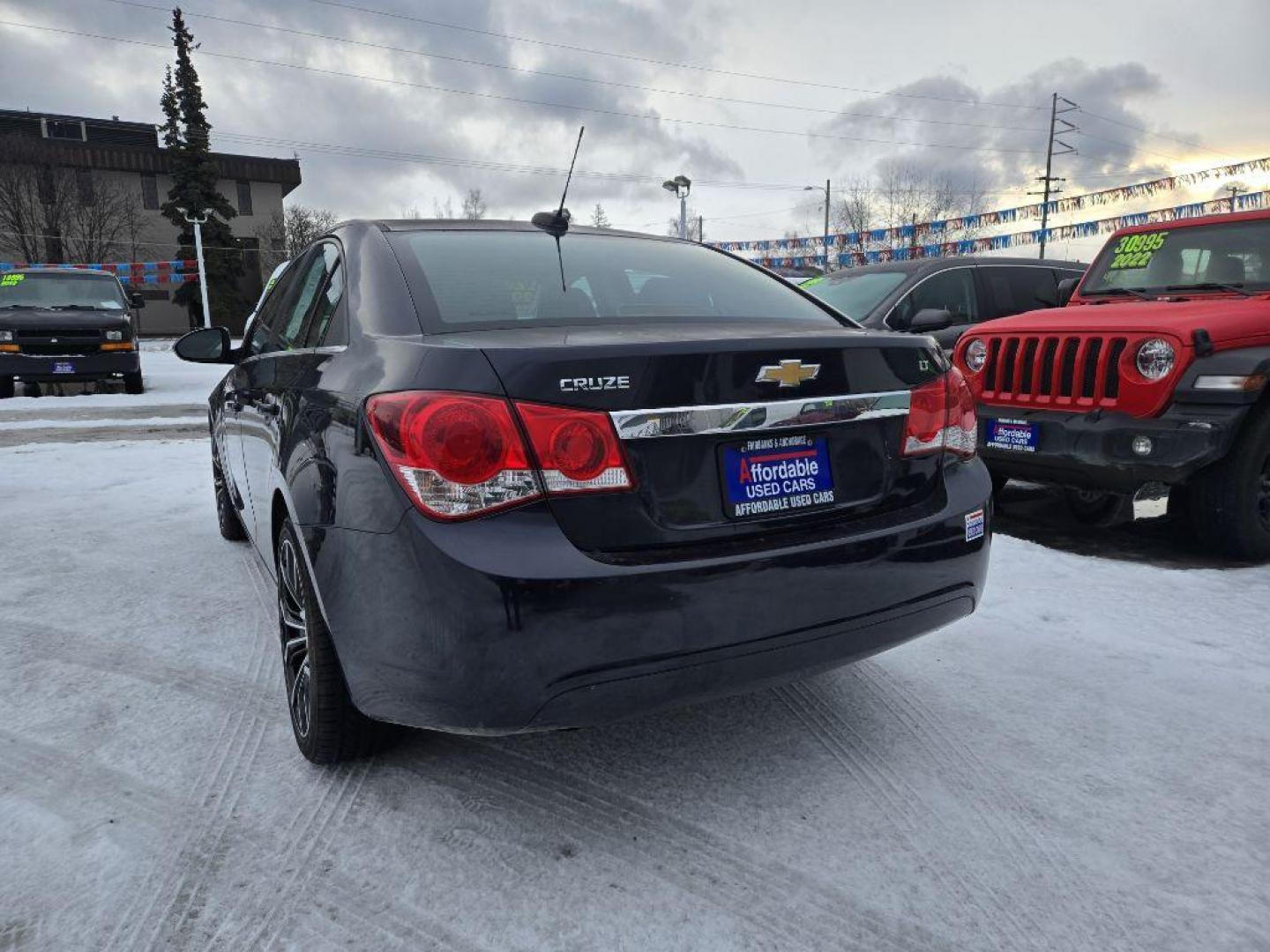 2016 BLUE CHEVROLET CRUZE LIMITED LT (1G1PE5SB9G7) with an 1.4L engine, Automatic transmission, located at 929 East 8th Ave, Anchorage, AK, 99501, (907) 274-2277, 61.214783, -149.866074 - Photo#2