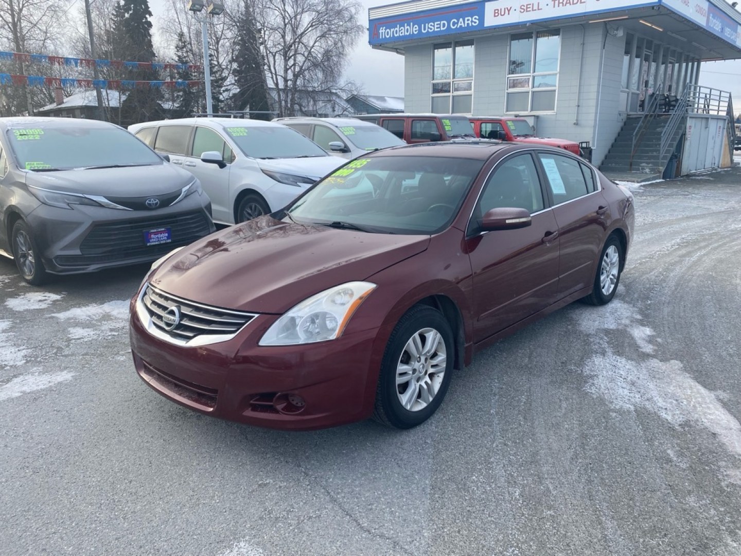 2010 MAROON NISSAN ALTIMA BASE (1N4AL2APXAN) with an 2.5L engine, Continuously Variable transmission, located at 929 East 8th Ave, Anchorage, AK, 99501, (907) 274-2277, 61.214783, -149.866074- Photo#0