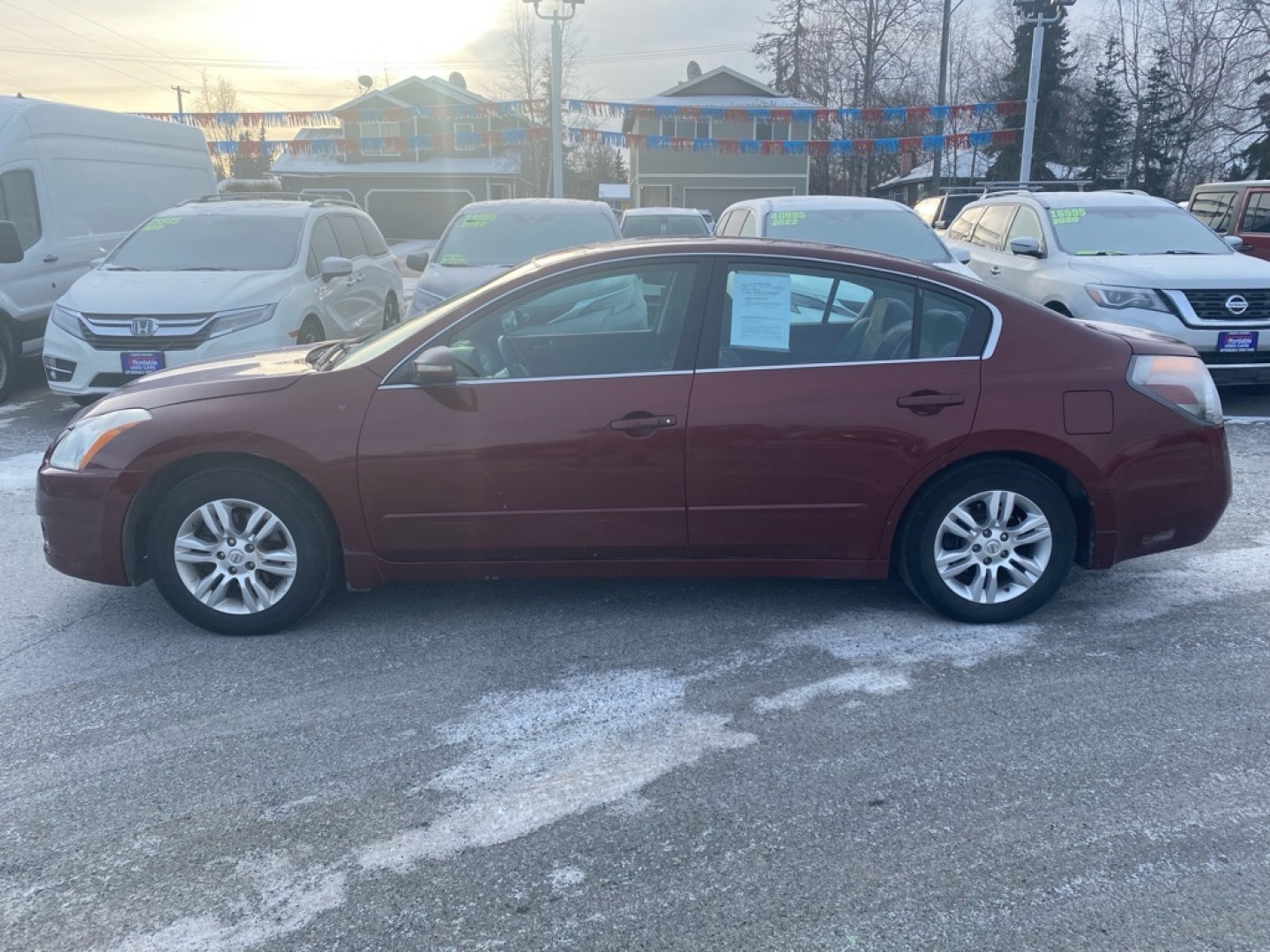 2010 MAROON NISSAN ALTIMA BASE (1N4AL2APXAN) with an 2.5L engine, Continuously Variable transmission, located at 929 East 8th Ave, Anchorage, AK, 99501, (907) 274-2277, 61.214783, -149.866074- Photo#1