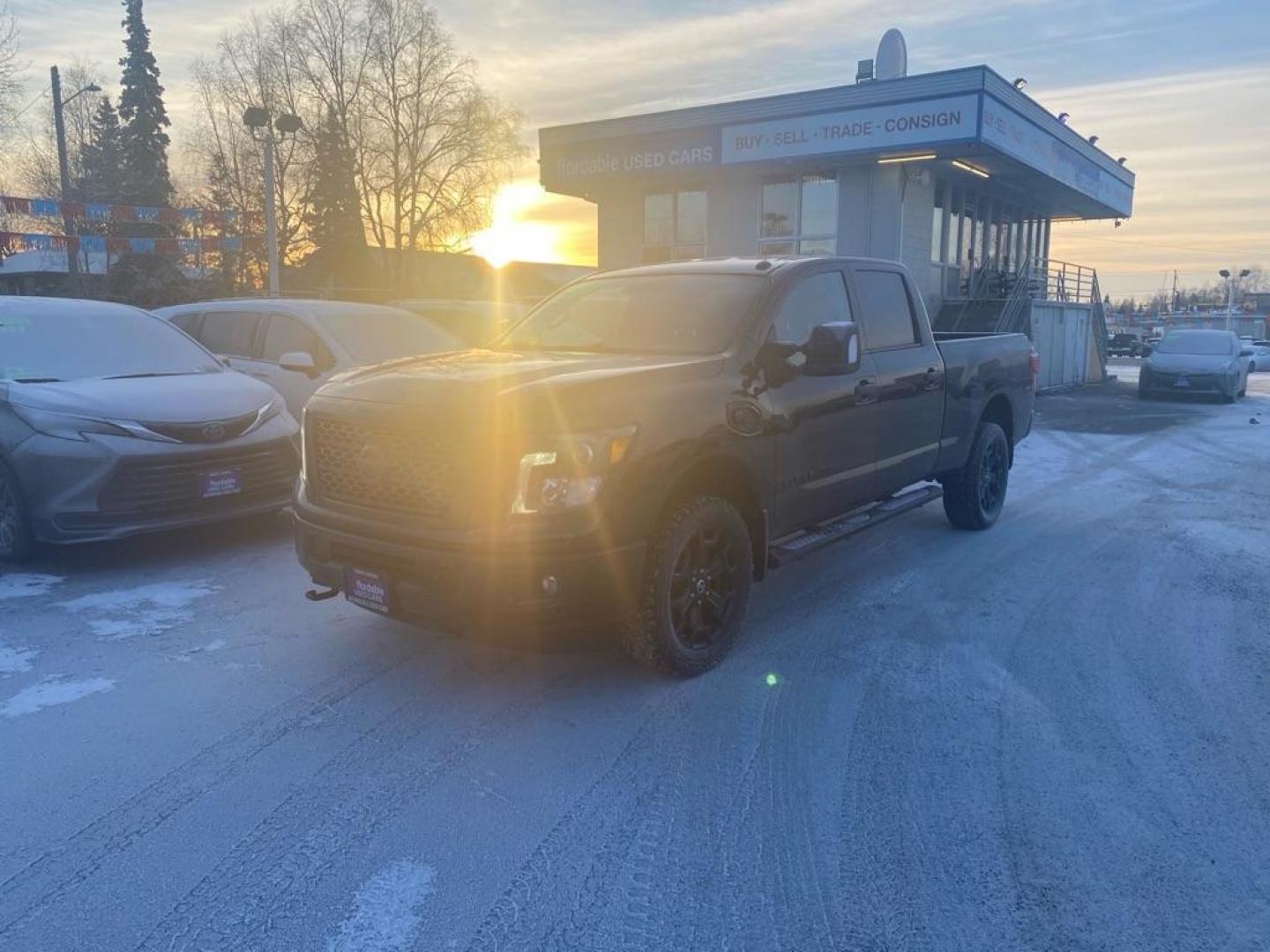 2018 BLACK NISSAN TITAN XD SL (1N6BA1F41JN) with an 5.0L engine, Automatic transmission, located at 929 East 8th Ave, Anchorage, AK, 99501, (907) 274-2277, 61.214783, -149.866074 - Photo#0