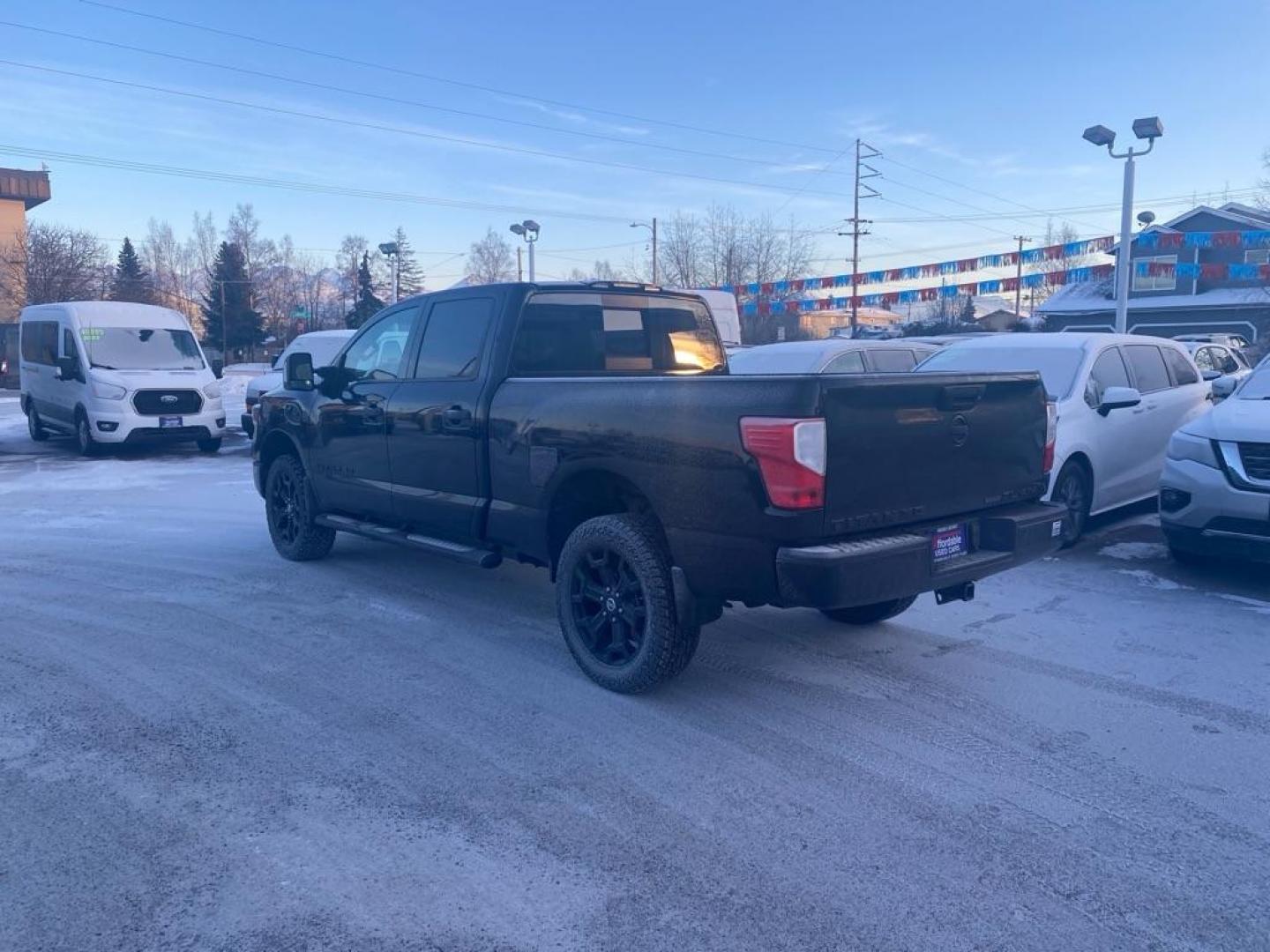 2018 BLACK NISSAN TITAN XD SL (1N6BA1F41JN) with an 5.0L engine, Automatic transmission, located at 929 East 8th Ave, Anchorage, AK, 99501, (907) 274-2277, 61.214783, -149.866074 - Photo#2