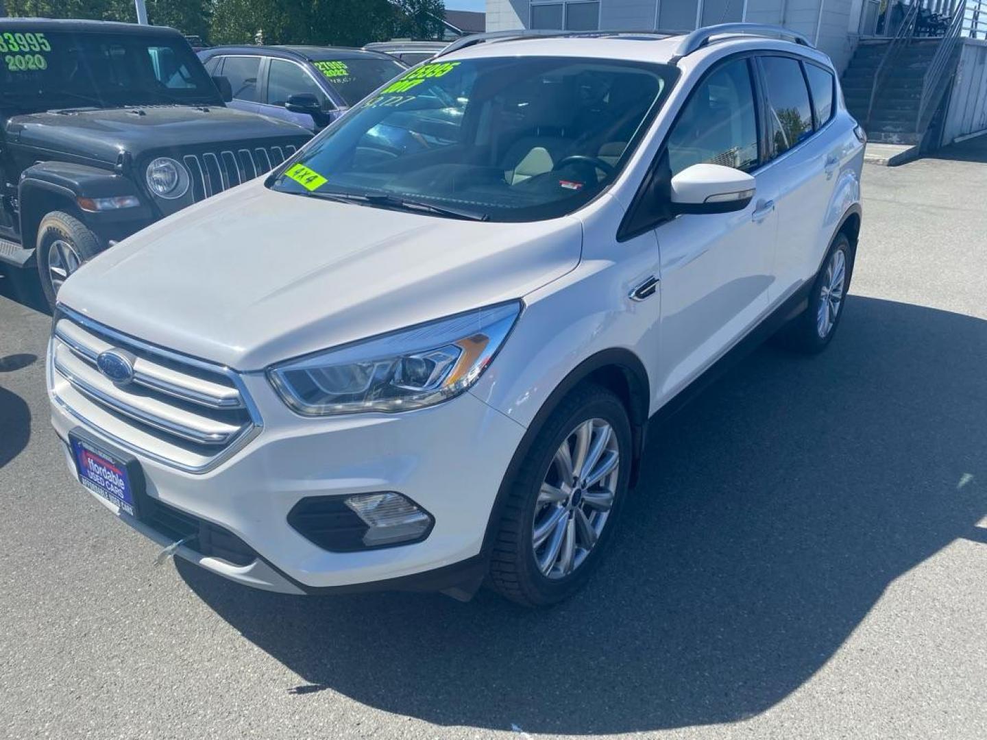 2017 WHITE FORD ESCAPE TITANIUM (1FMCU9JD7HU) with an 1.5L engine, Automatic transmission, located at 929 East 8th Ave, Anchorage, AK, 99501, (907) 274-2277, 61.214783, -149.866074 - Photo#0