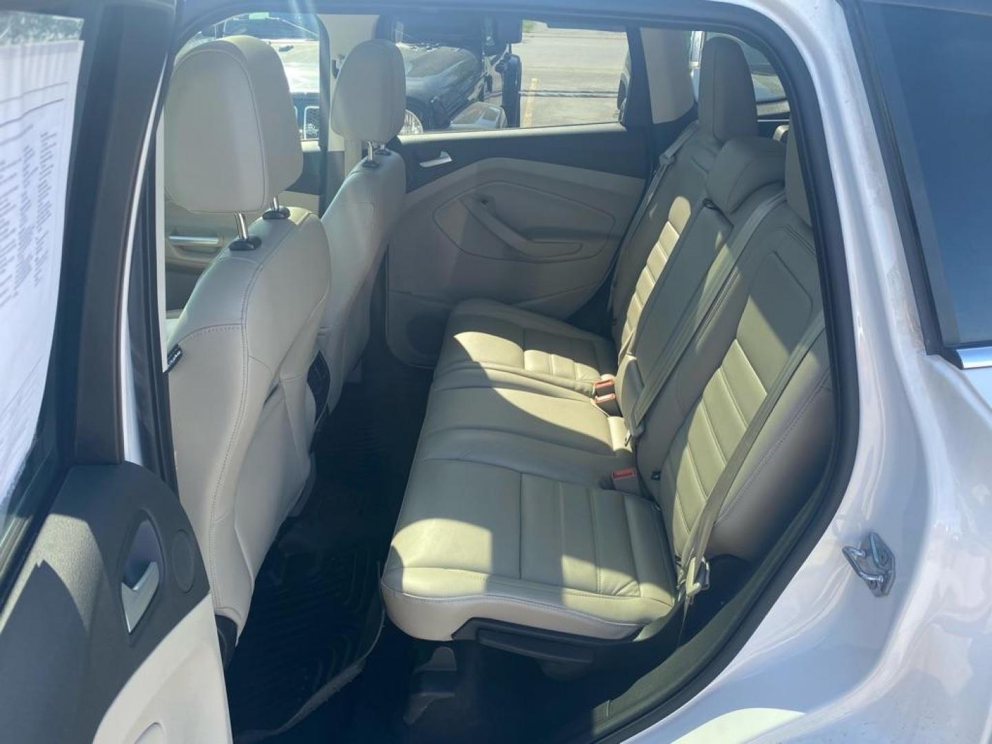 2017 WHITE FORD ESCAPE TITANIUM (1FMCU9JD7HU) with an 1.5L engine, Automatic transmission, located at 929 East 8th Ave, Anchorage, AK, 99501, (907) 274-2277, 61.214783, -149.866074 - Photo#3