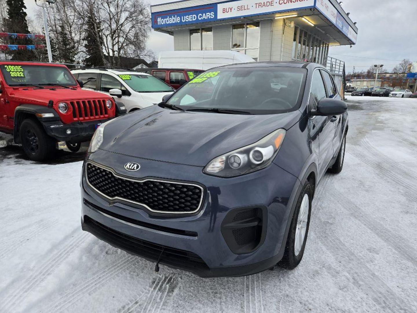 2017 BLUE KIA SPORTAGE LX (KNDPM3AC7H7) with an 2.4L engine, Automatic transmission, located at 929 East 8th Ave, Anchorage, AK, 99501, (907) 274-2277, 61.214783, -149.866074 - Photo#0