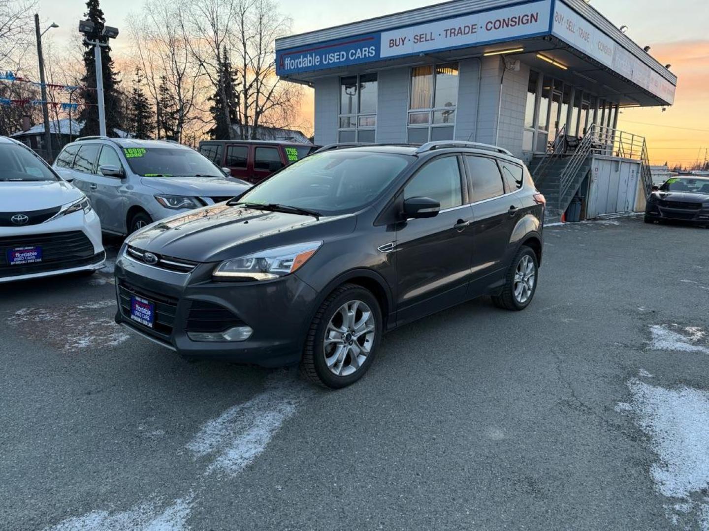 2015 GRAY FORD ESCAPE TITANIUM (1FMCU9J9XFU) with an 2.0L engine, Automatic transmission, located at 929 East 8th Ave, Anchorage, AK, 99501, (907) 274-2277, 61.214783, -149.866074 - Photo#0