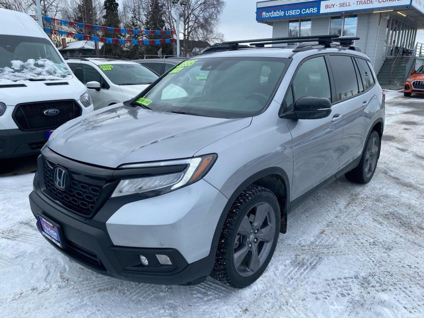 2021 SILVER HONDA PASSPORT TOURING (5FNYF8H95MB) with an 3.5L engine, Automatic transmission, located at 929 East 8th Ave, Anchorage, AK, 99501, (907) 274-2277, 61.214783, -149.866074 - Photo#0