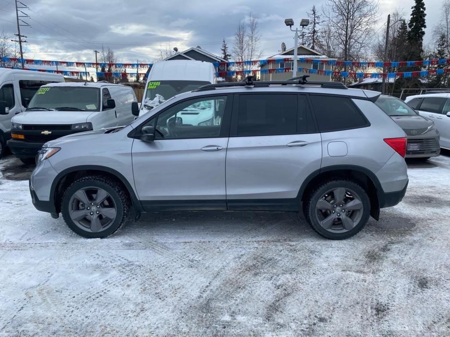 2021 SILVER HONDA PASSPORT TOURING (5FNYF8H95MB) with an 3.5L engine, Automatic transmission, located at 929 East 8th Ave, Anchorage, AK, 99501, (907) 274-2277, 61.214783, -149.866074 - Photo#1