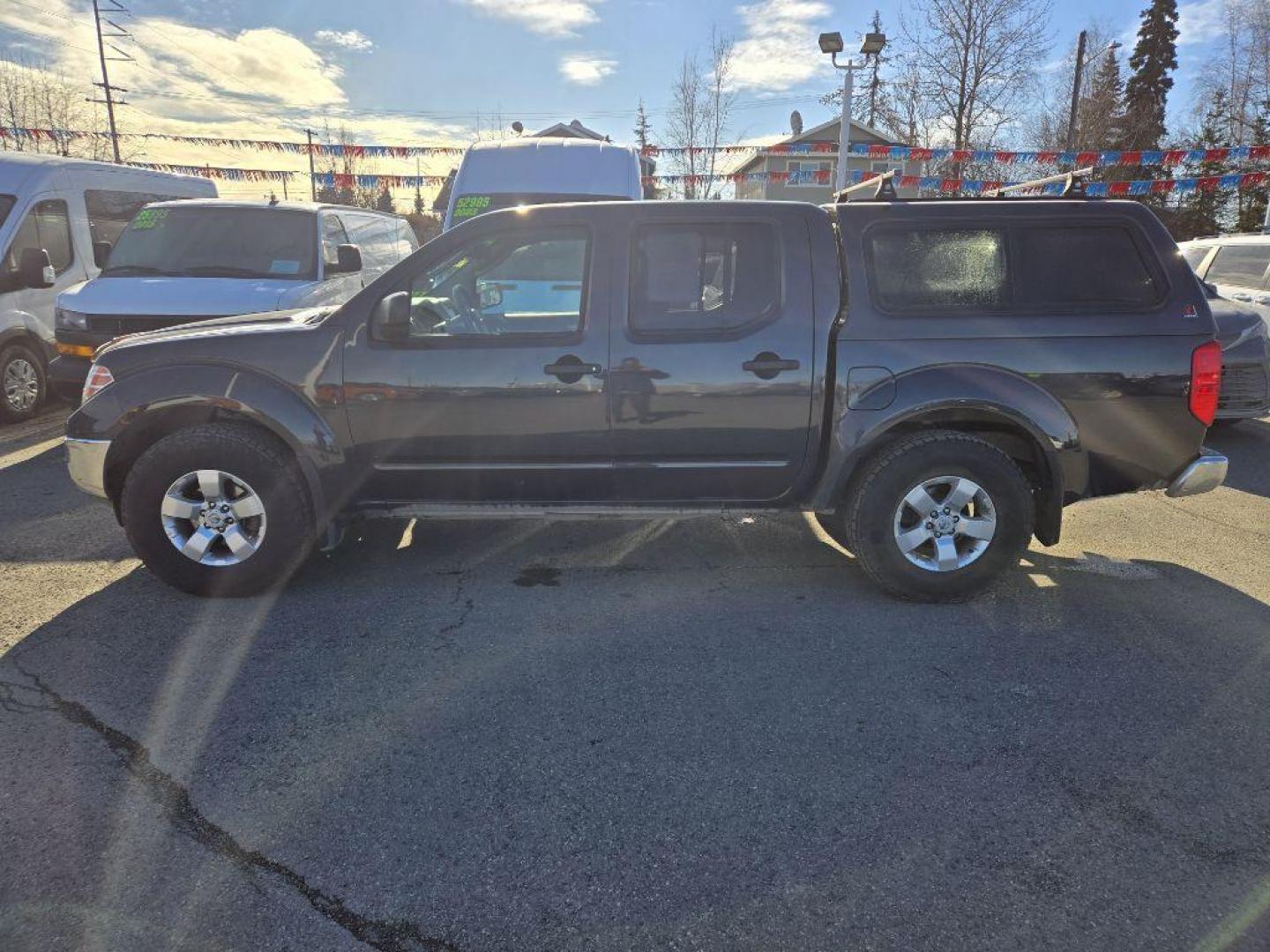 2010 BLACK NISSAN FRONTIER CREW CAB SE (1N6AD0EVXAC) with an 4.0L engine, Automatic transmission, located at 929 East 8th Ave, Anchorage, AK, 99501, (907) 274-2277, 61.214783, -149.866074 - Photo#1