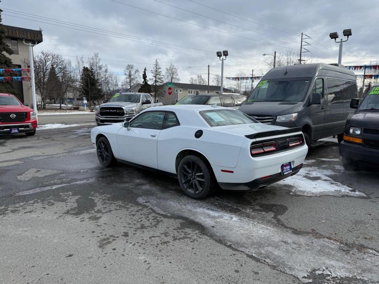 2021 WHITE DODGE CHALLENGER SXT (2C3CDZGG2MH) with an 3.6L engine, Automatic transmission, located at 929 East 8th Ave, Anchorage, AK, 99501, (907) 274-2277, 61.214783, -149.866074 - Photo#2